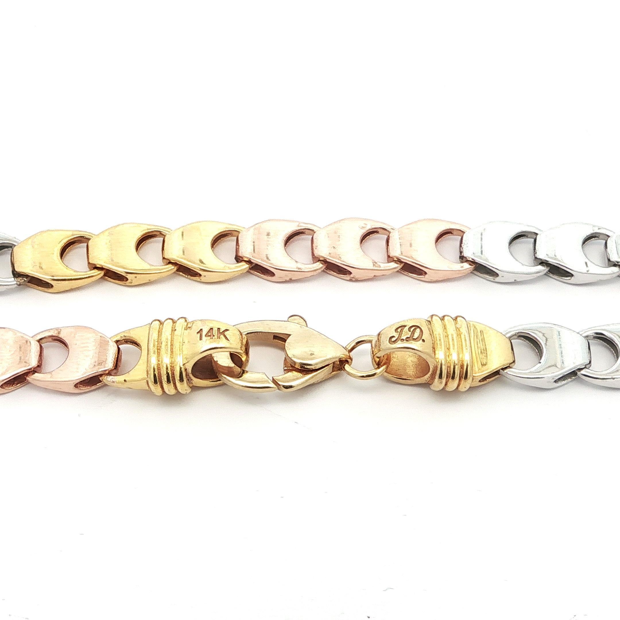 Material: Oro rosa, amarillo y blanco macizo de 14 quilates
Peso: 58.6 gramos
Tipo de cadena: Eslabón de fantasía de 3 mm
Longitud de la cadena: 24 pulgadas (medida junto a una regla)
Grosor de la cadena:	7mm (0.27