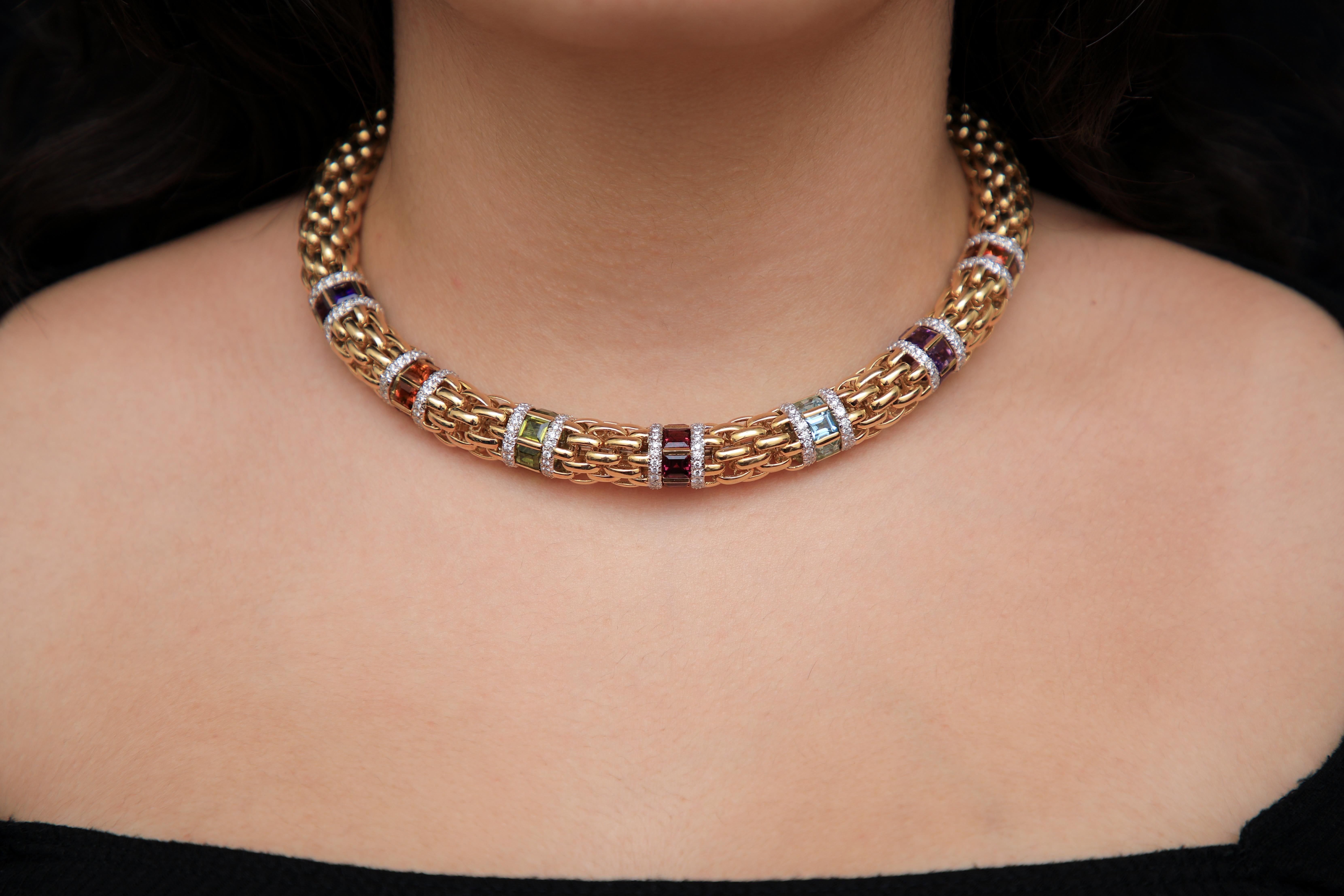 Solid Heavy 18 Karat Gold Multi-Color Gemstone Choker Necklace
Multi color necklace to make a breathtaking statement. Listed above is a solid 18k Italian flexible collar mesh link necklace of 168.5 grams. Approximately 7.0 carats of diamonds F-G