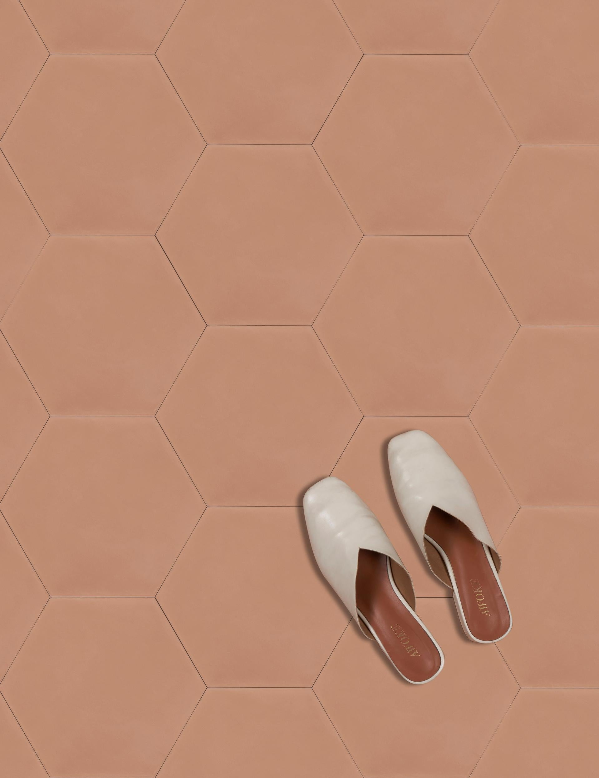 Available in our full palette in both cement and ceramic tile, these solid-shade hexagonal tiles can stand alone or mix with other colors to create a multi-color surface. They can also be coordinated with our moon phase tiles for a calming mix of