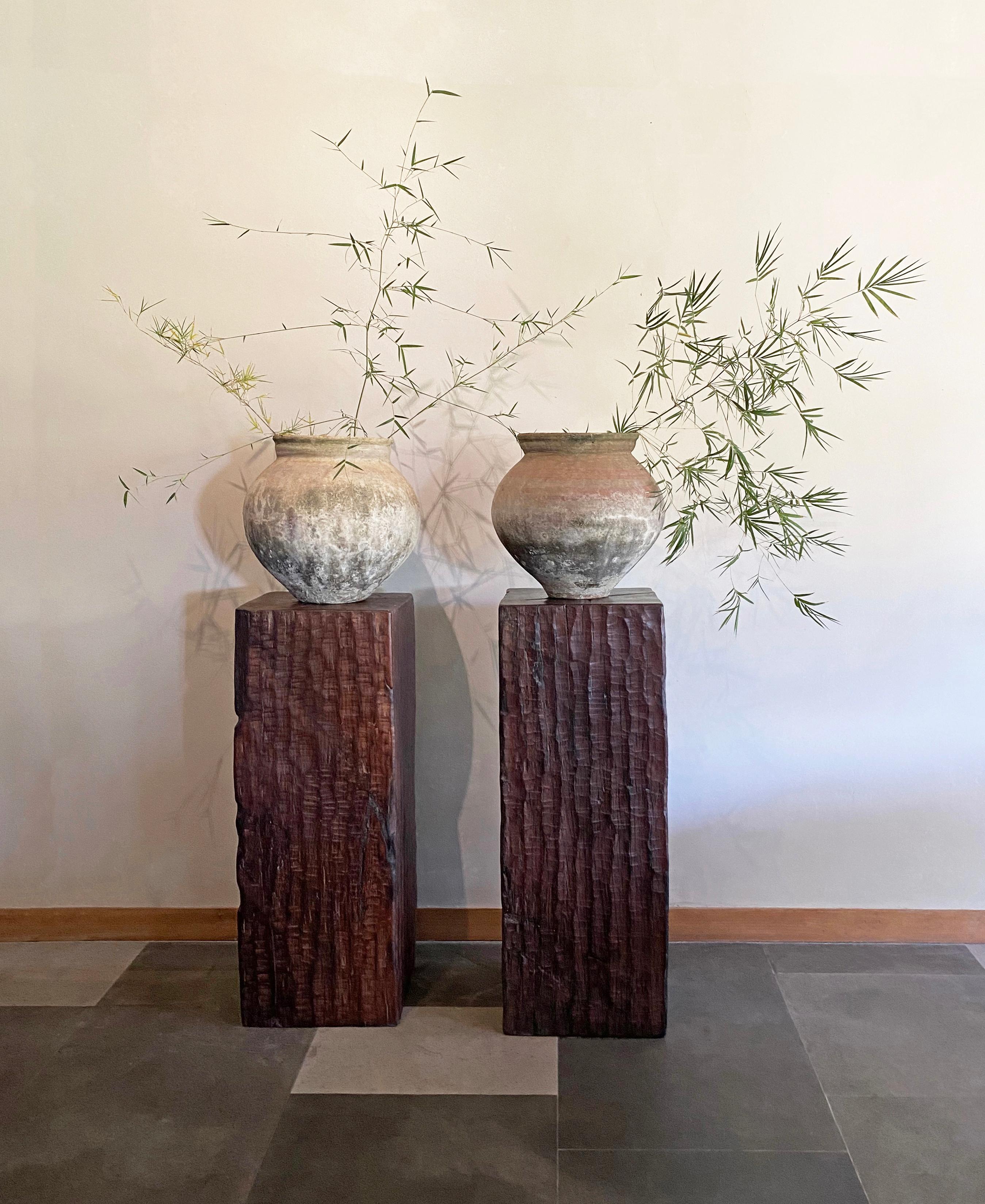 An incredibly heavy and solid Iron Wood Pedestal sourced from Kalimantan, Indonesia. This lovely sculptural object was crafted from a solid block of wood. A raw and organic object with beautiful textures. Indonesian Iron Wood, or 