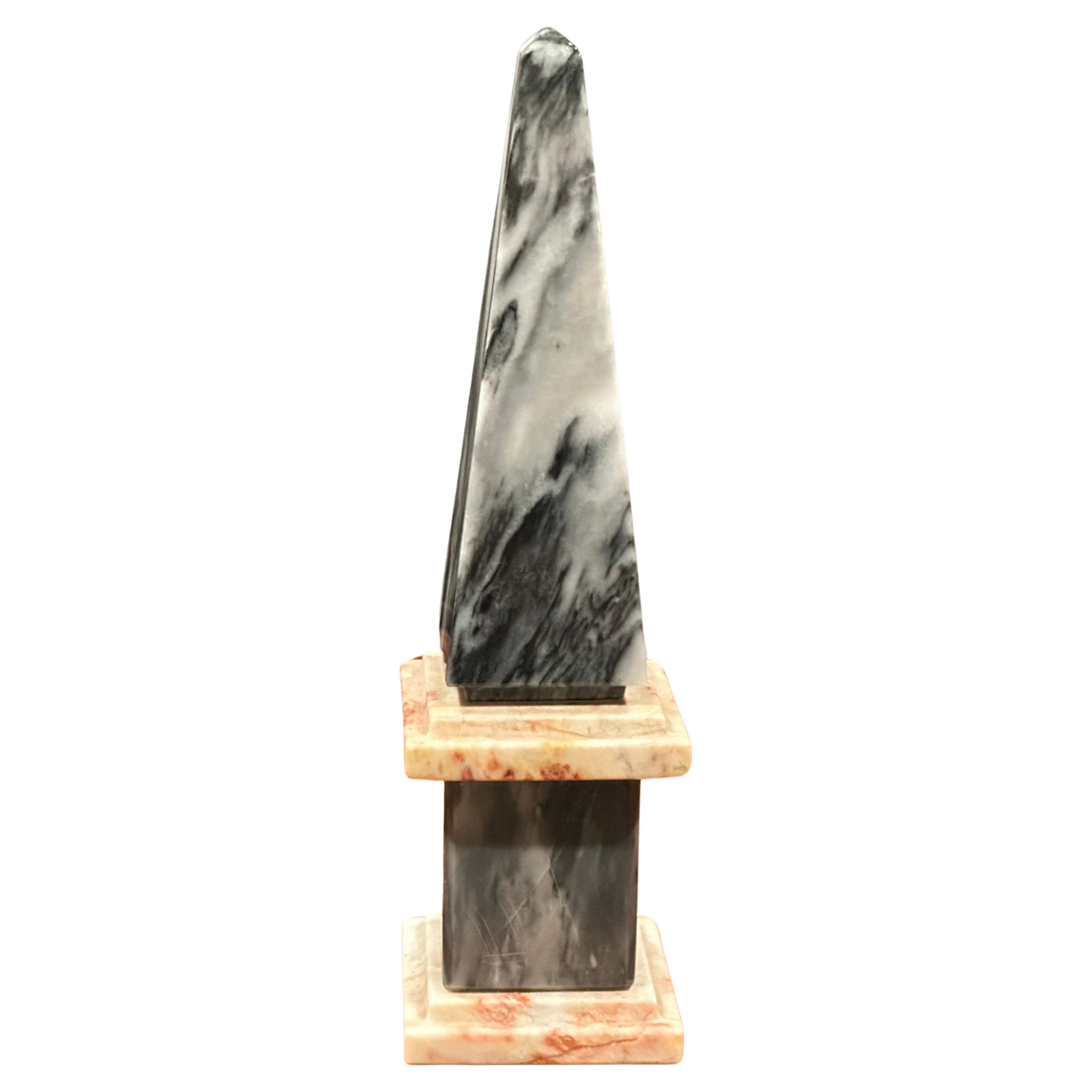 Beautiful solid Italian marble decorative obelisk, circa 1980s. The piece is in very good vintage condition with no chips or cracks and is nicely polished. The piece is 2.75