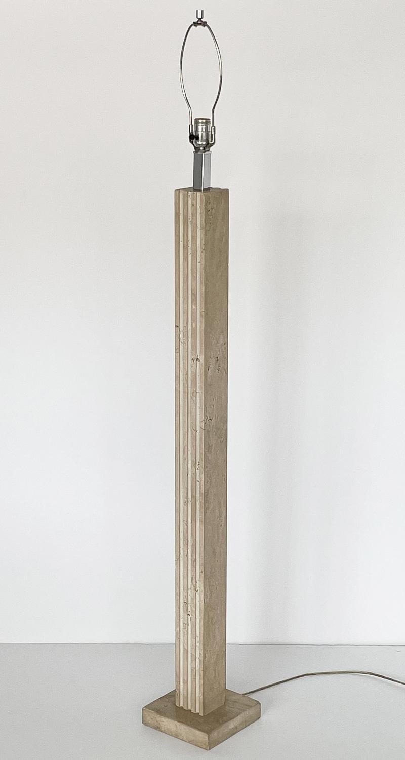 Modern Italian solid travertine floor lamp by Goffredo Reggiani for Raymor, circa 1960s. Solid travertine lamp with vertical ribbed design on both the front and back of the 3