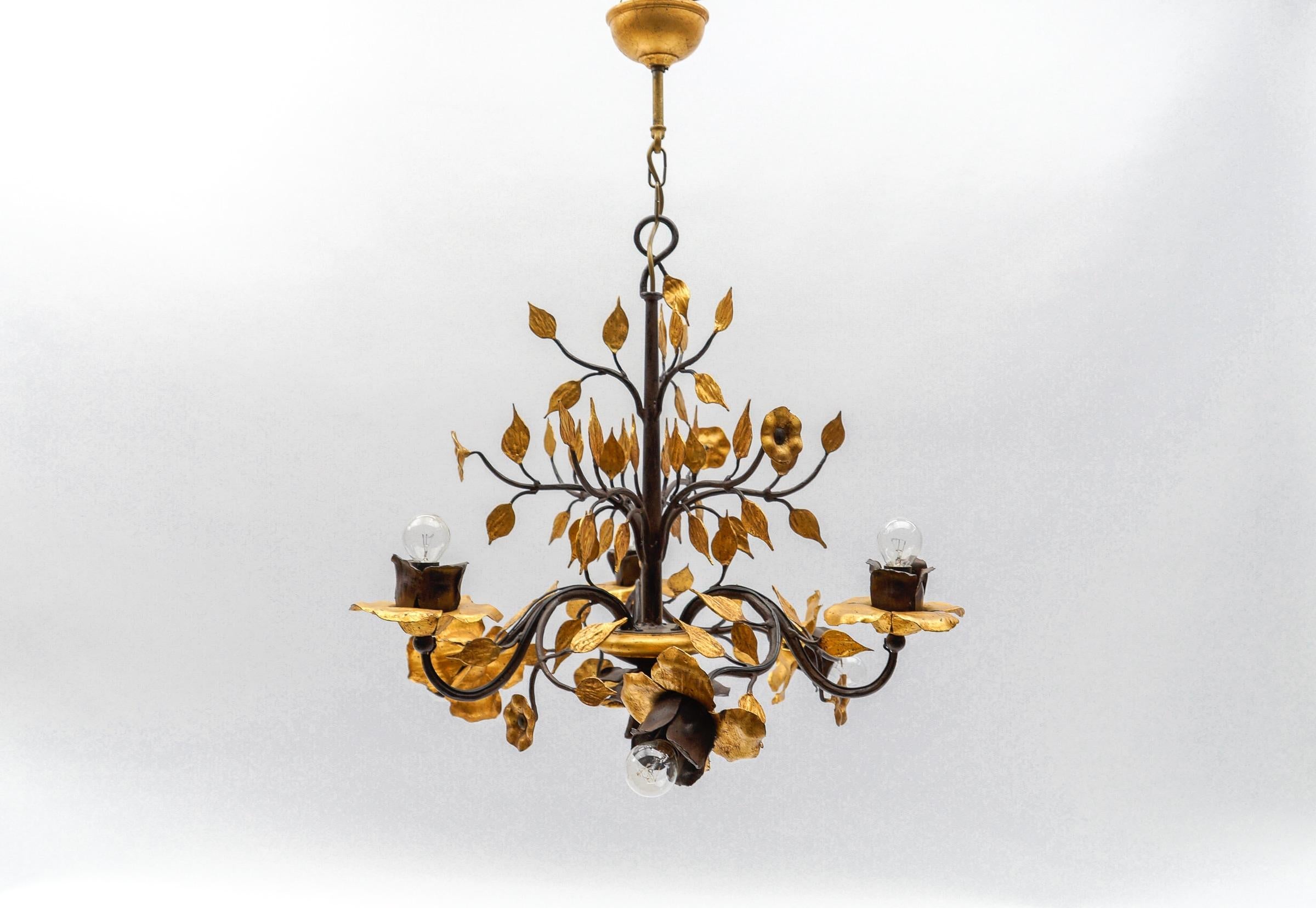 Large Mid-Century Modern Gilded Wrought Iron Ceiling Lamp, 1970s

Fantastic craftsmanship. The leaves are gilded, the branches and leaves are perfectly formed.

Dimensions
Diameter: 24.80 in. (63 cm)
Height: 31.49 in. (80 cm)

Six E14 sockets. Works