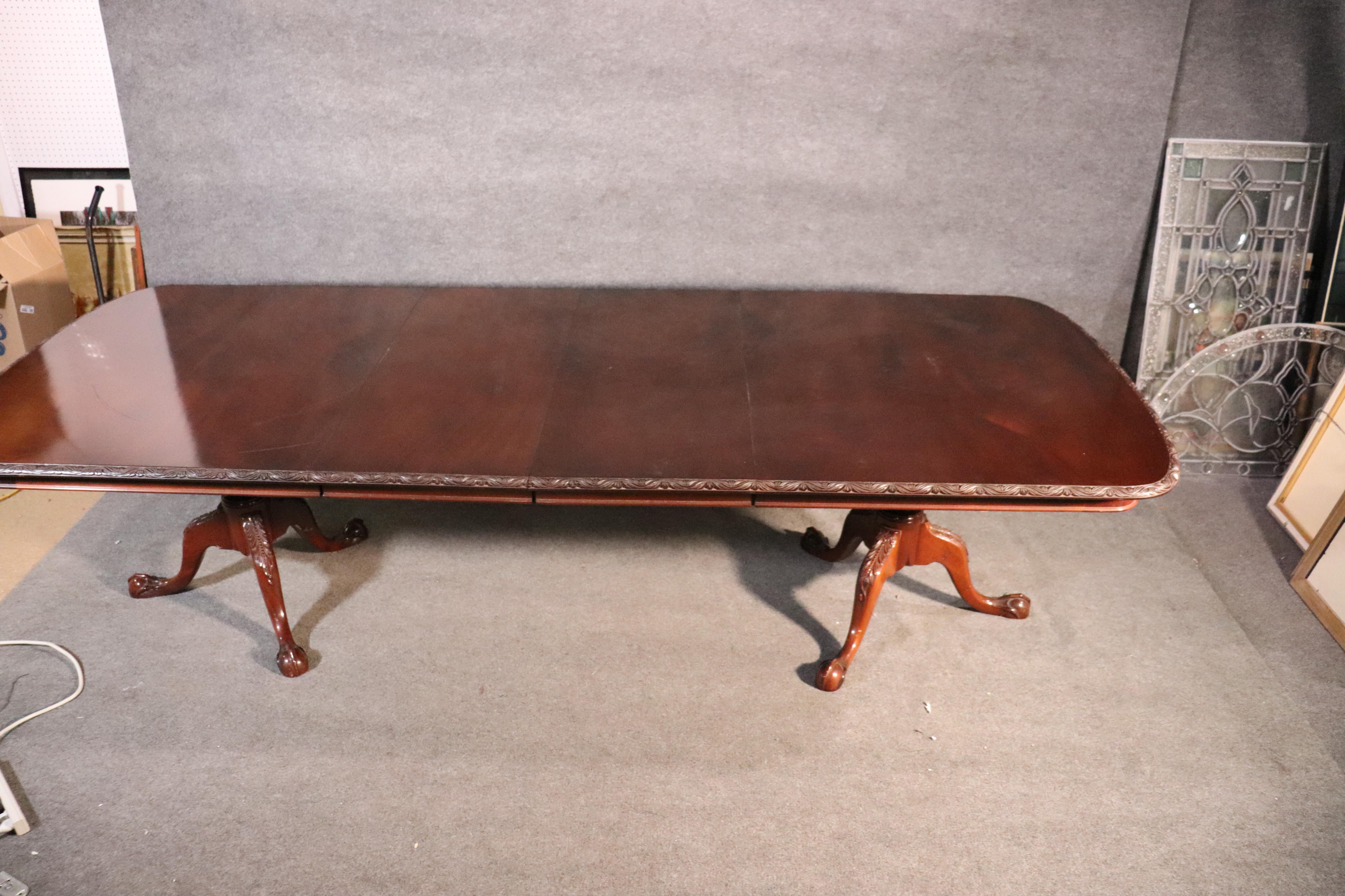 This is a very high quality table, circa 1940. The table has two leaves that each measure 19 inches for an additional 38 inches of length. The table measures 80 inches long x 47 wide x 30 inches tall. The leaves add to that 80 inches for a great