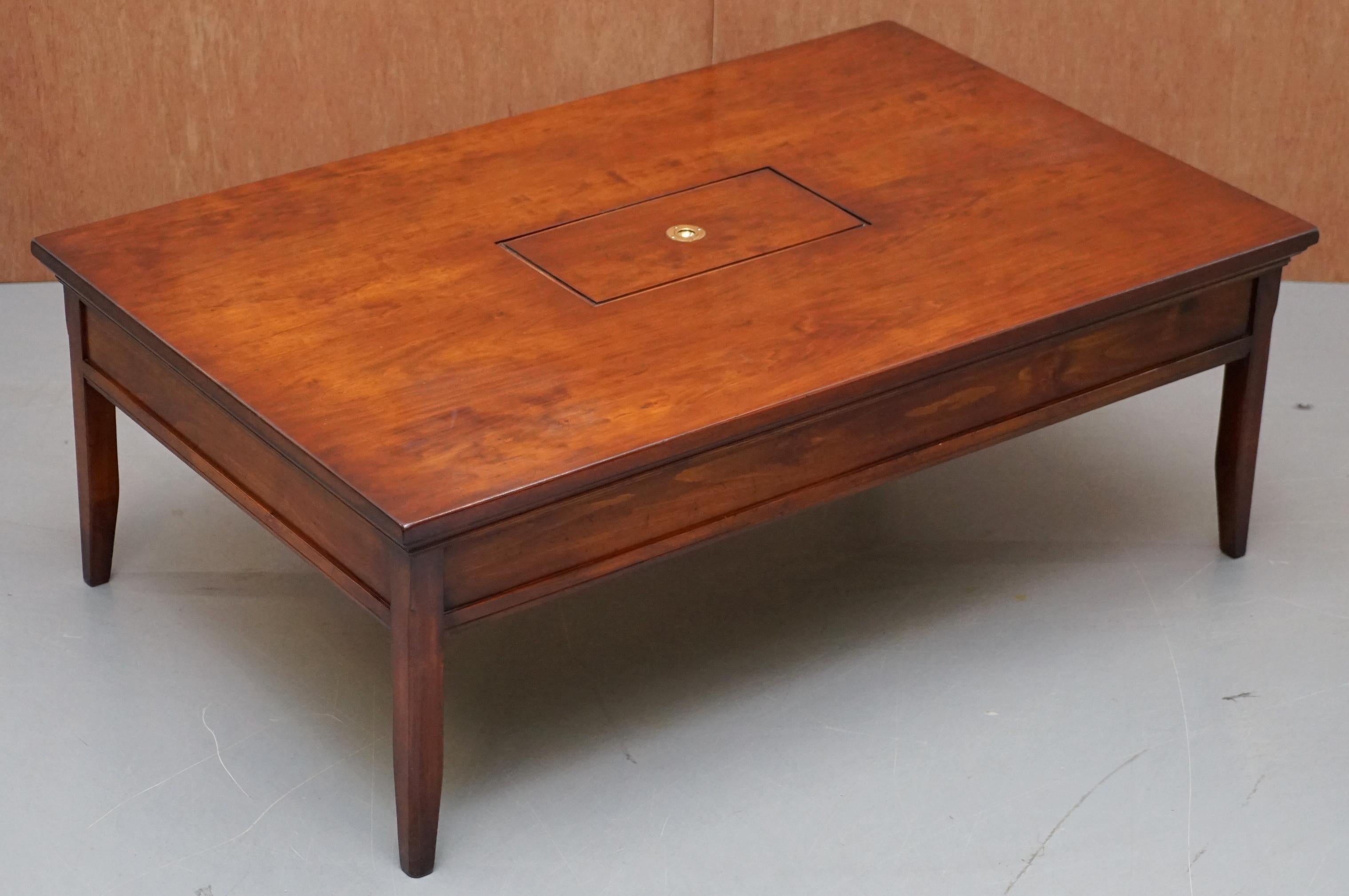 We are delighted to offer for sale this stunning solid mahogany Military Campaign coffee table with internal storage made by REH Kennedy and retailed through Harrods London

A good looking well made and decorative coffee table, we have restored it