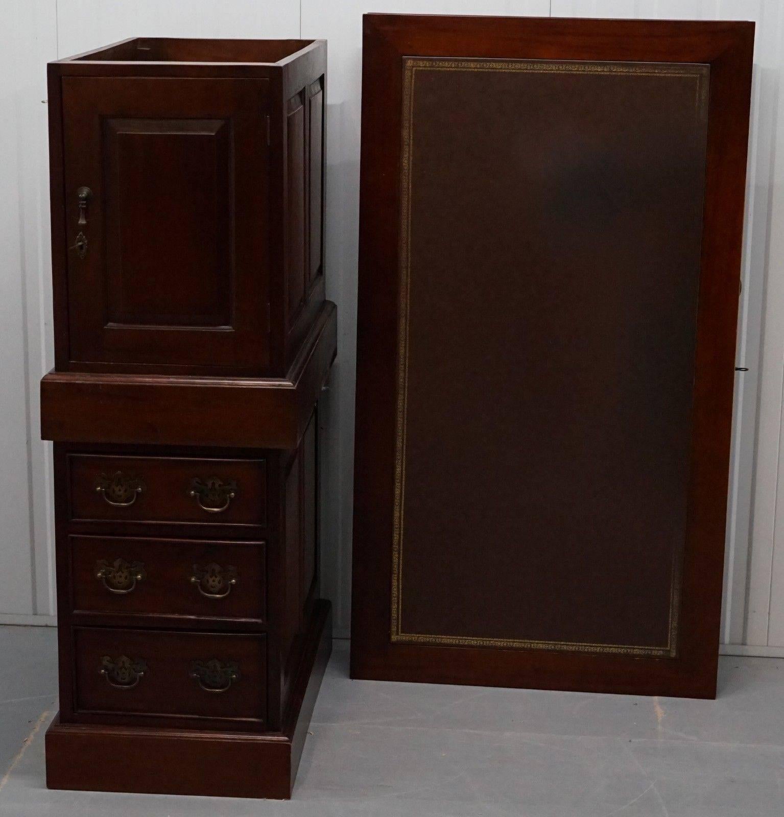 We are delighted to offer for sale lovely solid mahogany twin pedestal partner desk, custom designed for use with computers

A very well made and functional piece, to the right you have a large cupboard which can hold a tower PC or printer, to the