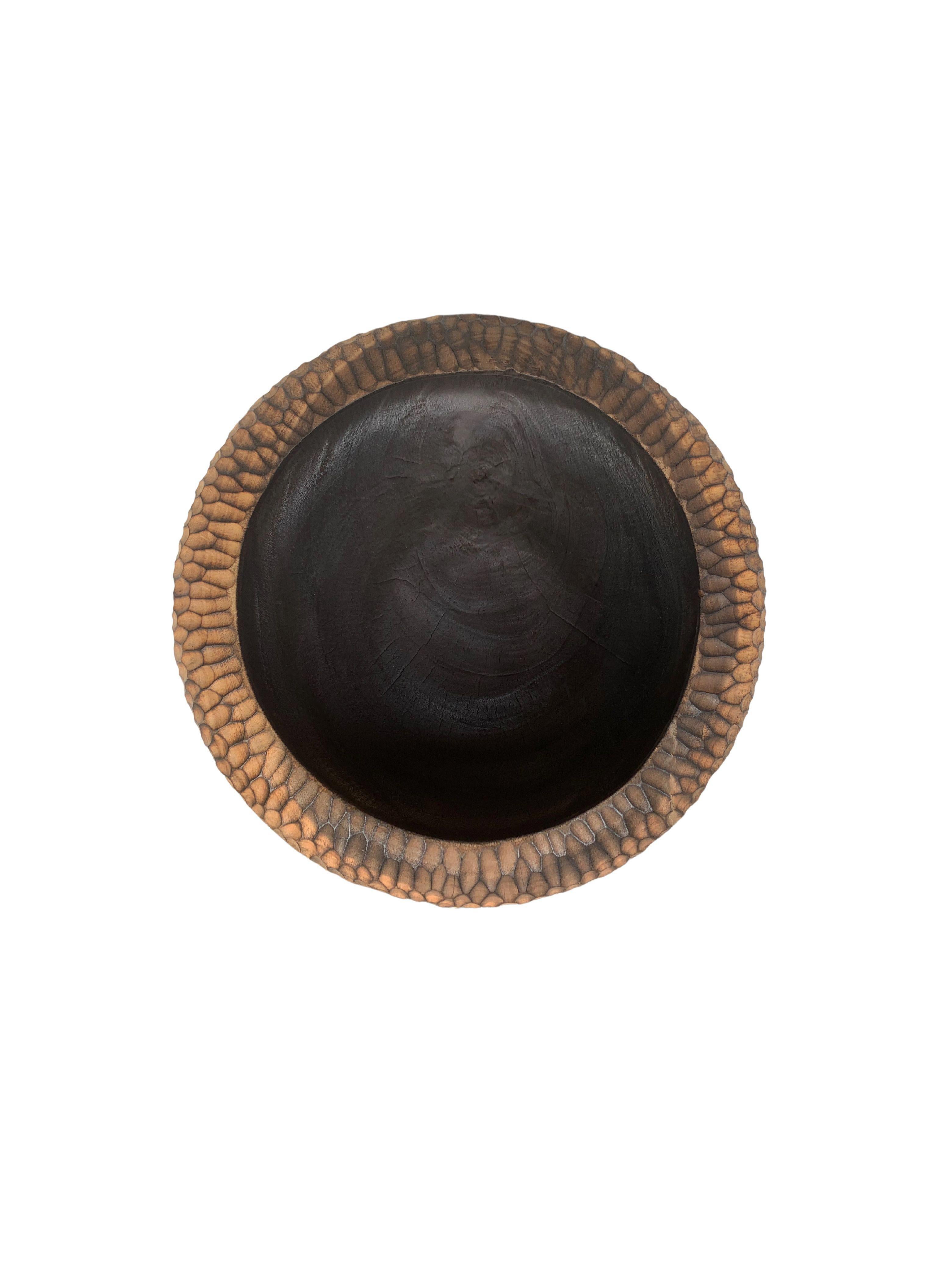Carved Solid Mango Wood Bowl with Hand-Hewn Detailing and Burnt Detailing For Sale