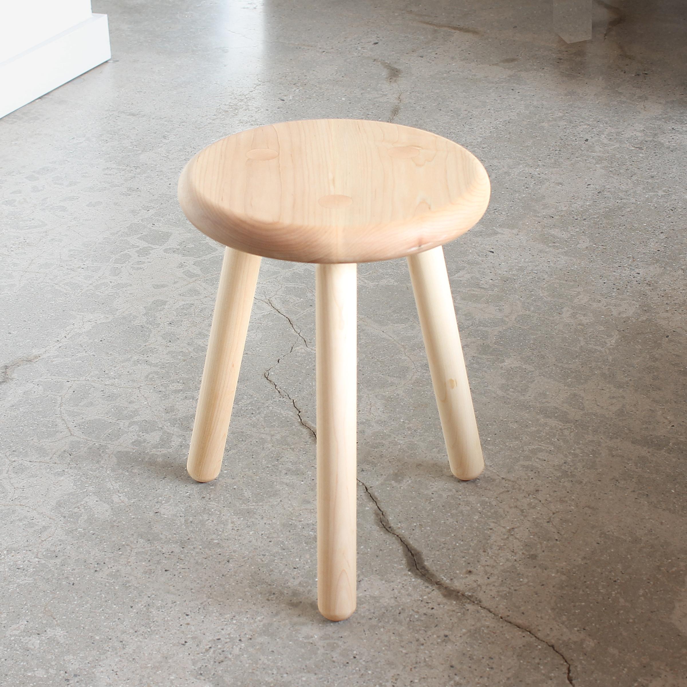 Solid maple 3 leg stool hand crafted in Los Angeles. Turned Legs and seat offer solid, always planted perch for everyday activities such as meditation or just putting on shoes. Legs mortised through seat and display the handcrafted joinery. Finished