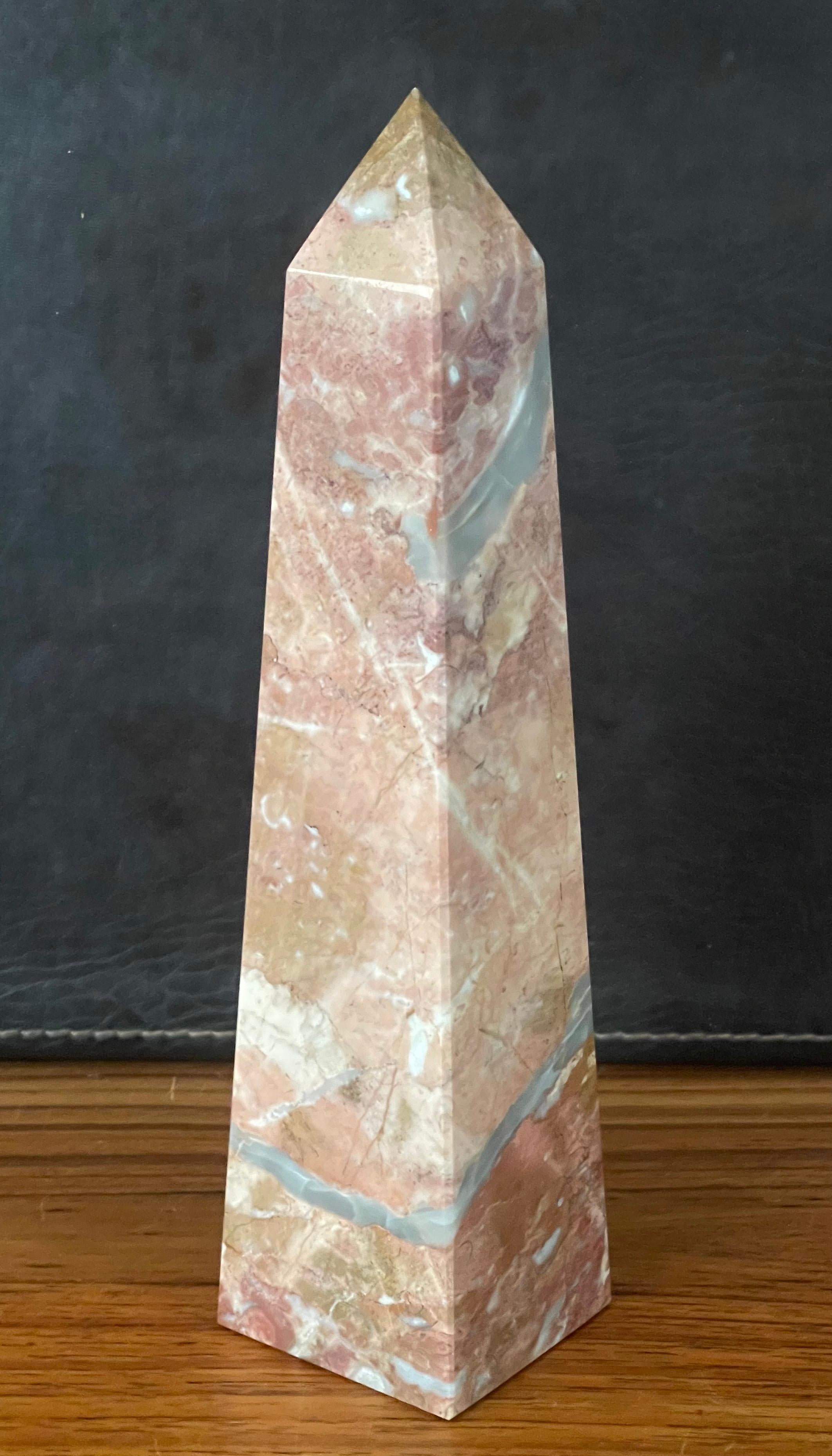 Beautiful solid marble decorative obelisk, circa 1970s. The piece is in very good vintage condition with no chips or cracks and is nicely polished. The piece is 2.875