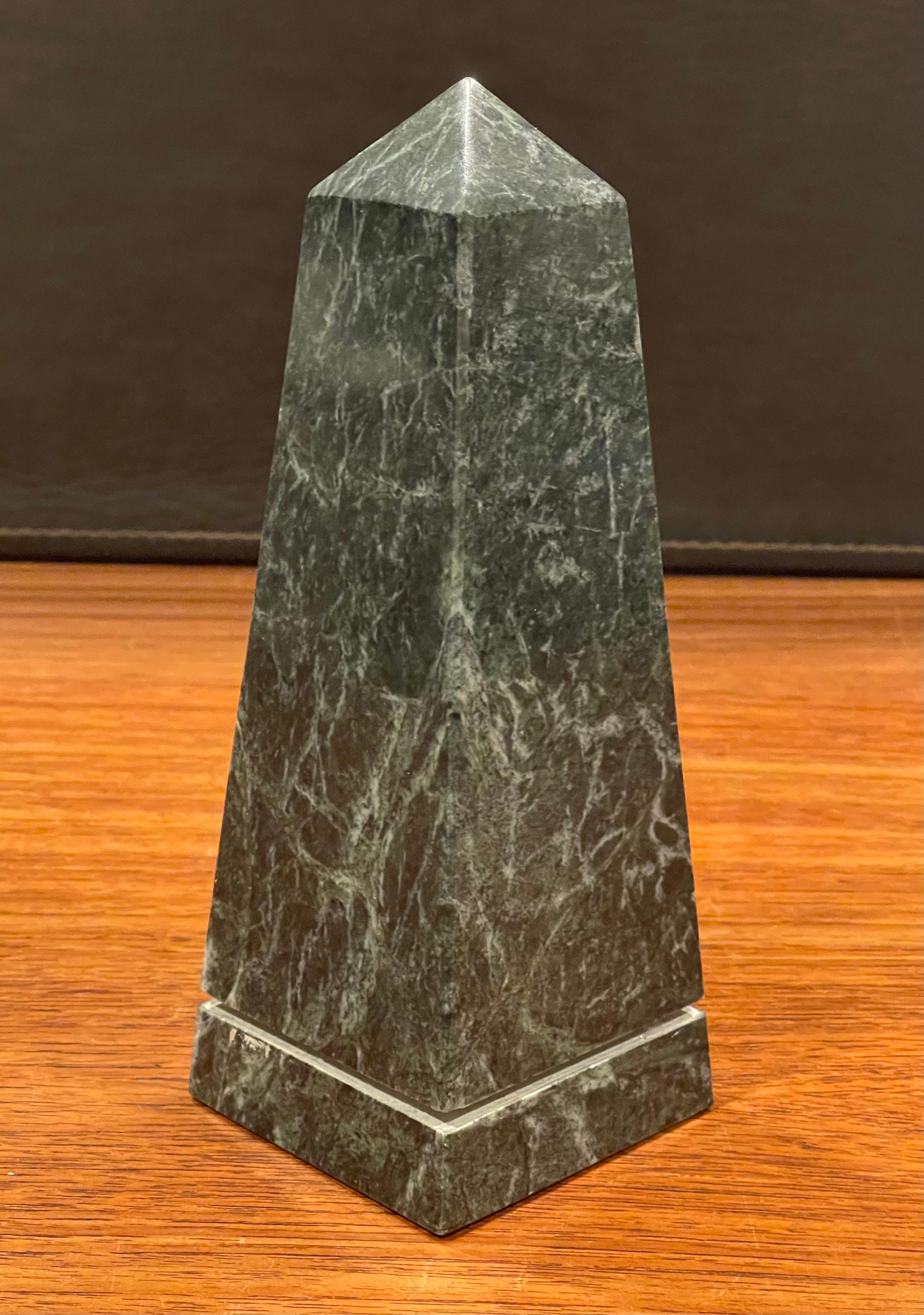 Beautiful solid green marble decorative obelisk, circa 1970s. The piece is in very good vintage condition with no chips or cracks and is nicely polished. The piece is 2.75