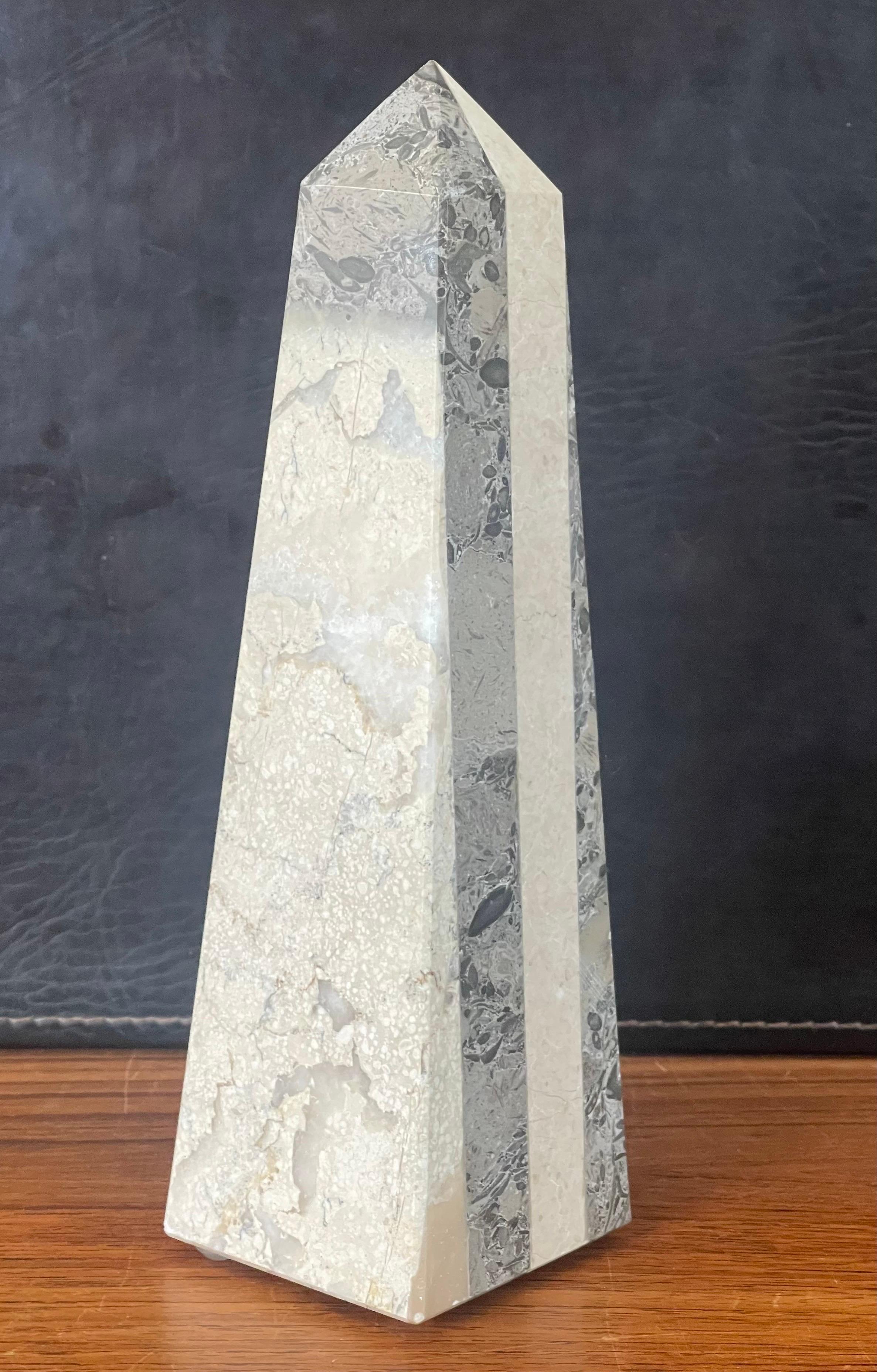 Beautiful solid mixed marble decorative obelisk, circa 1970s. The piece is in very good vintage condition with no chips or cracks and is nicely polished. The piece is 2.875