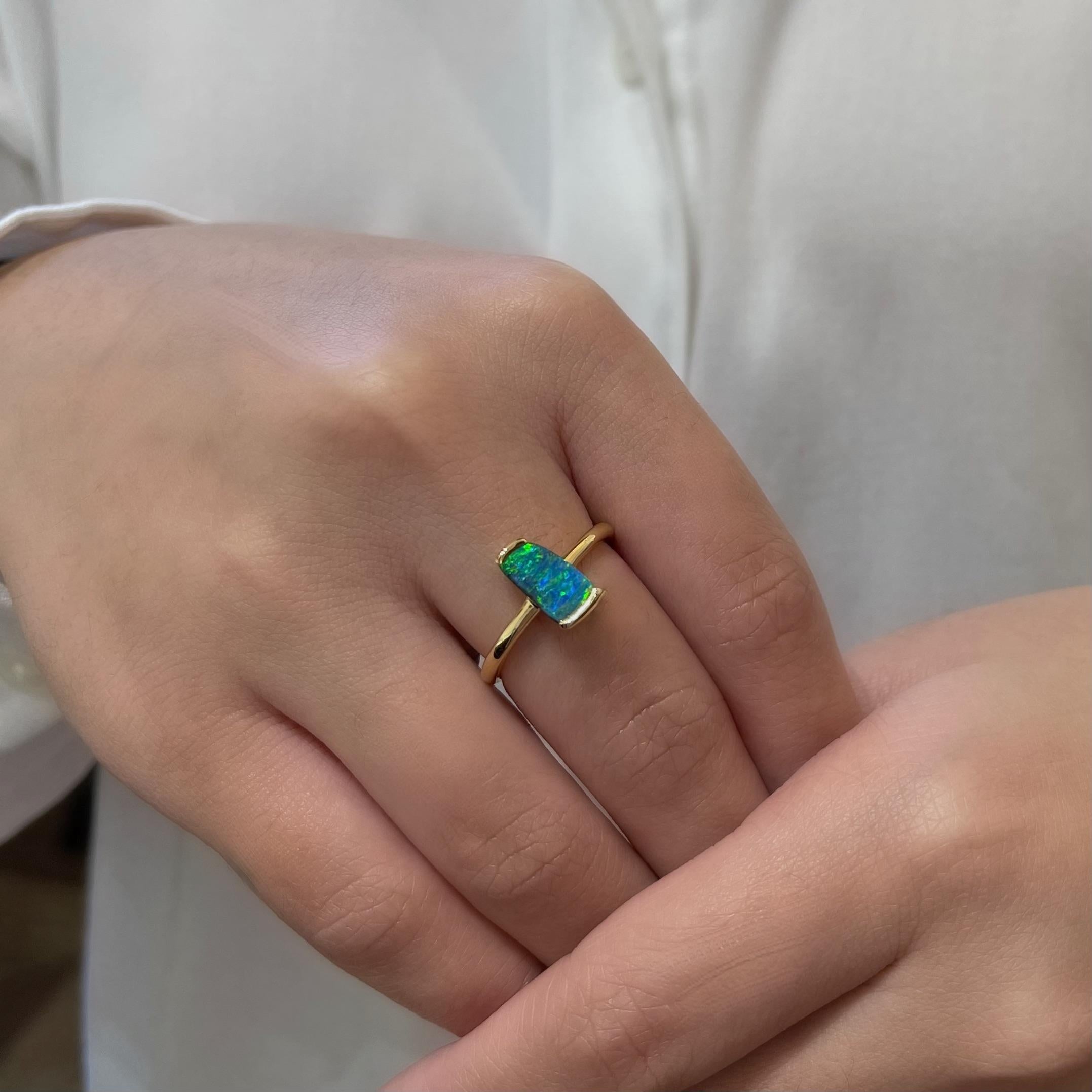Simple yet elegant, the ‘Crystal Cascade’ opal ring features a boulder opal (1.35ct) ethically sourced from famous Winton mines in Queensland, Australia. The striking blue-green play of colour in this ring adds a beautiful touch to your outfit and