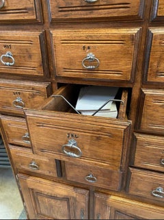 Solid oak apothecary cabinet with drawers