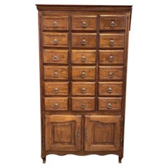 Solid oak apothecary cabinet with drawers