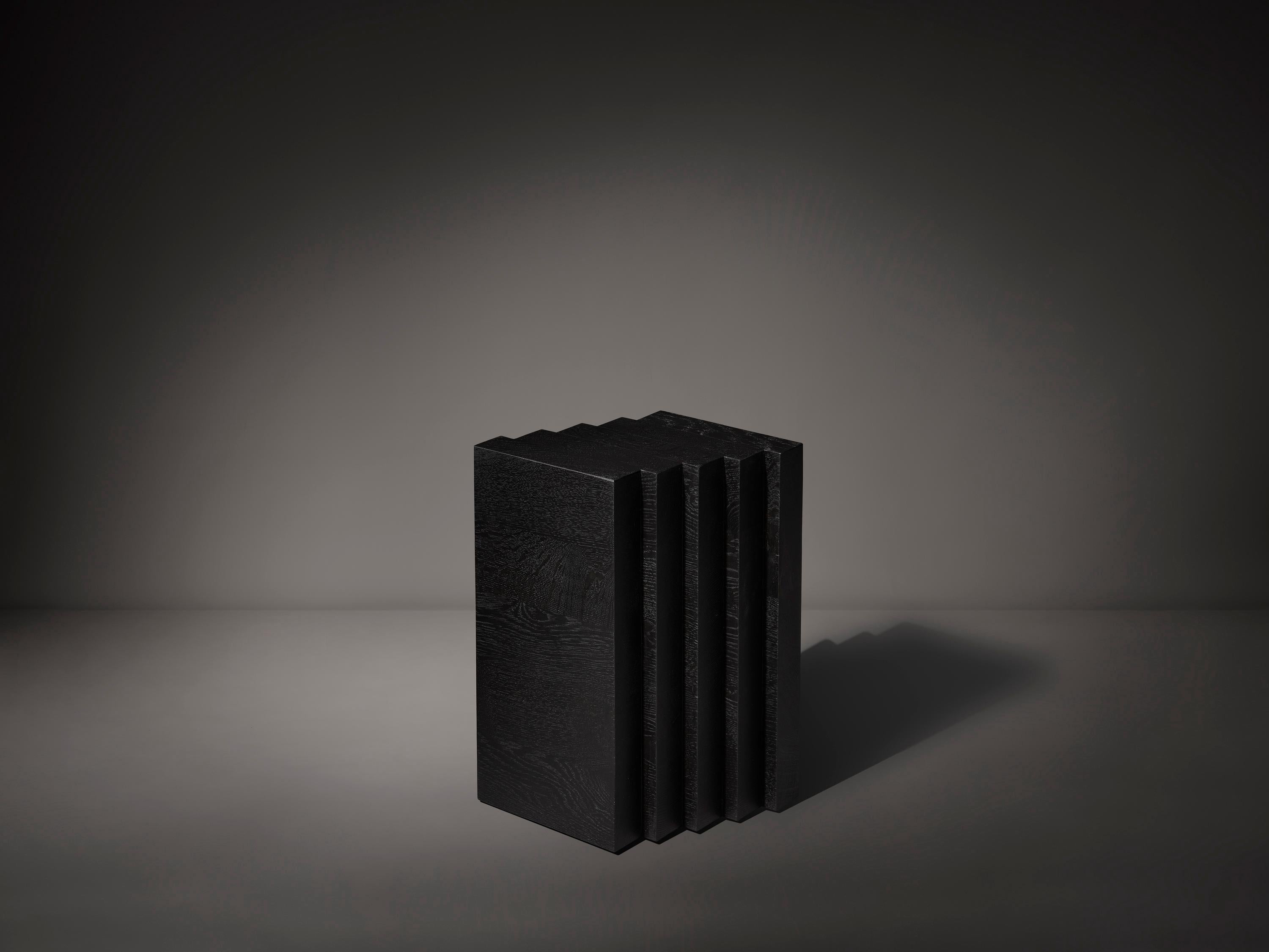 Form follows rhythm. The Cadence side tables are inspired by the simplicity and power of the rhythmic stepped brickwork visible in the architecture of Amsterdam's 'South Plan' area; the city development plan designed by H.P. Berlage in 1915.