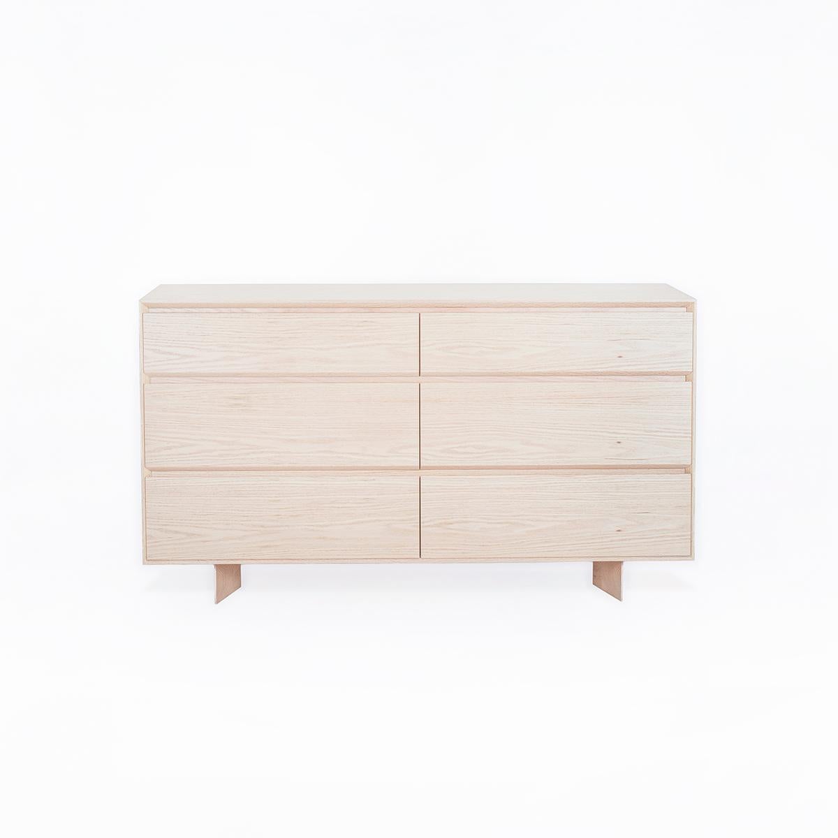 The BEAM Series Solid Oak Drawer Dresser is designed to offer both aesthetic appeal and functionality in your home. Crafted from durable and uniquely textured oak wood, this solid wood bedroom dresser is handcrafted, reflecting the natural beauty