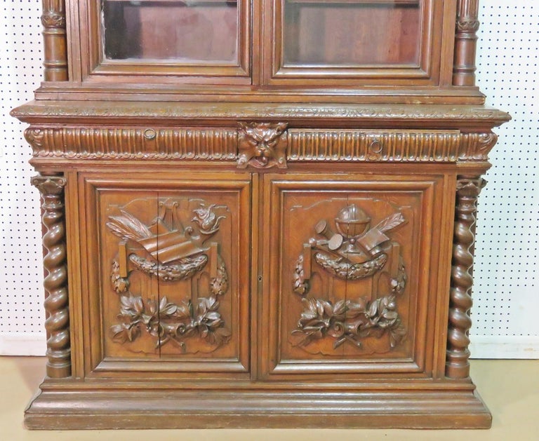 European Solid Oak French Carved Two Piece China Cabinet Bookcase circa 1870s For Sale