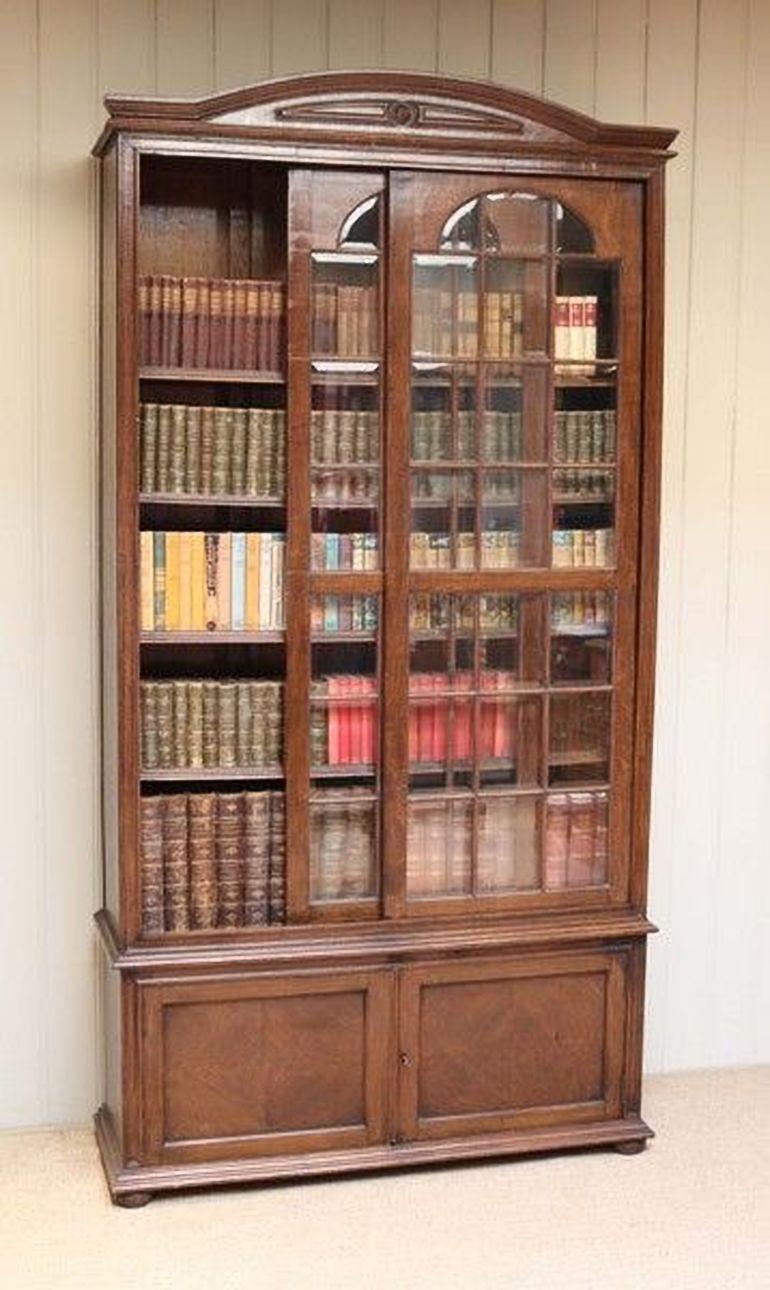 British Solid Oak Glazed Bookcase For Sale