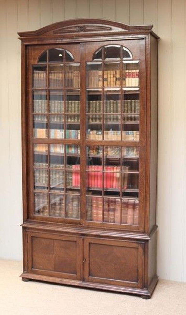 Polished Solid Oak Glazed Bookcase For Sale