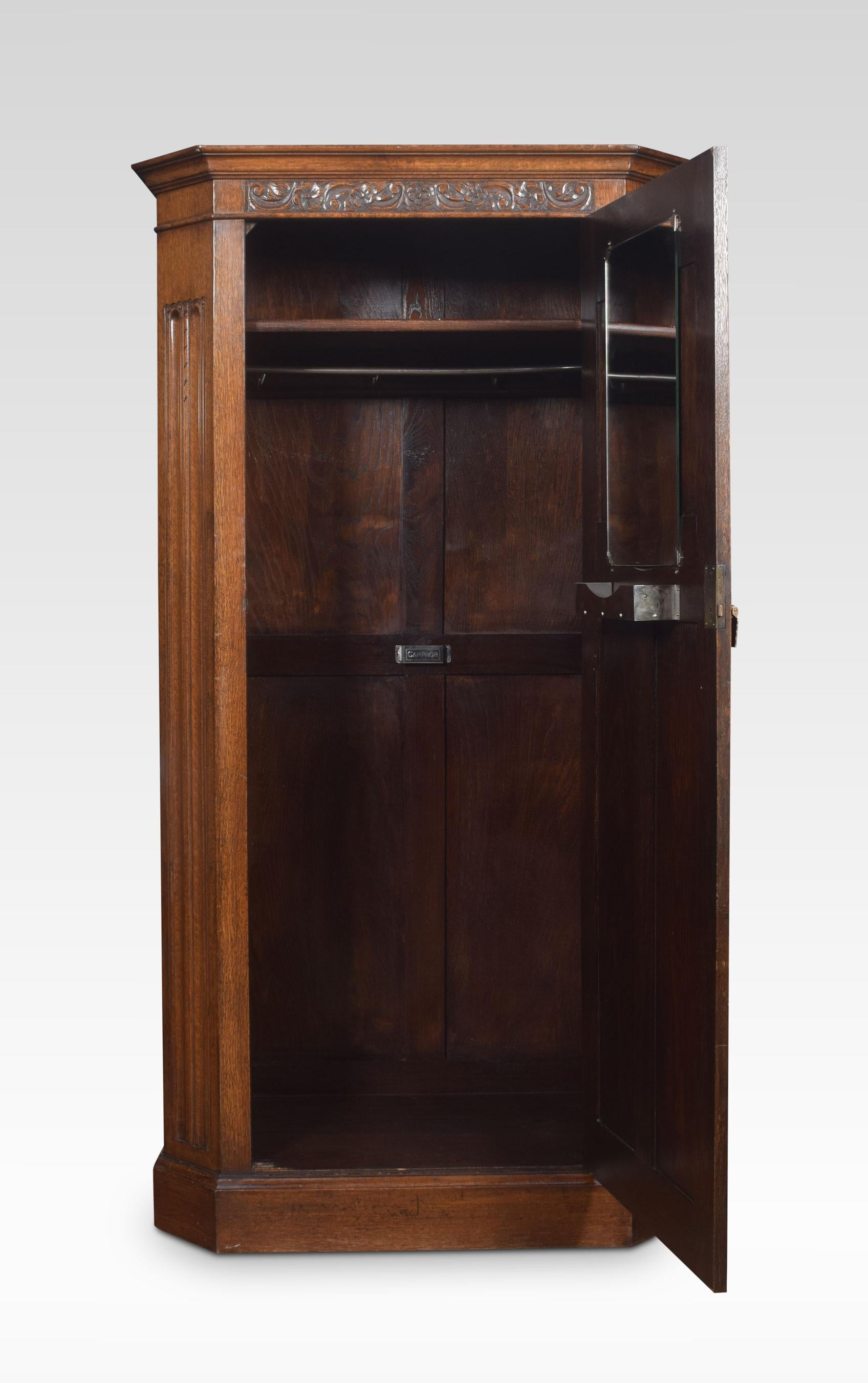 Oak hall robe, the molded cornice above large carved panel door with linenfold decoration. opening to reveal a hanging cupboard. Flanked by canned sides, all raised up on bun feet.
Dimensions:
Height 73 inches
Width 39.5 inches
Depth 20.5 inches.