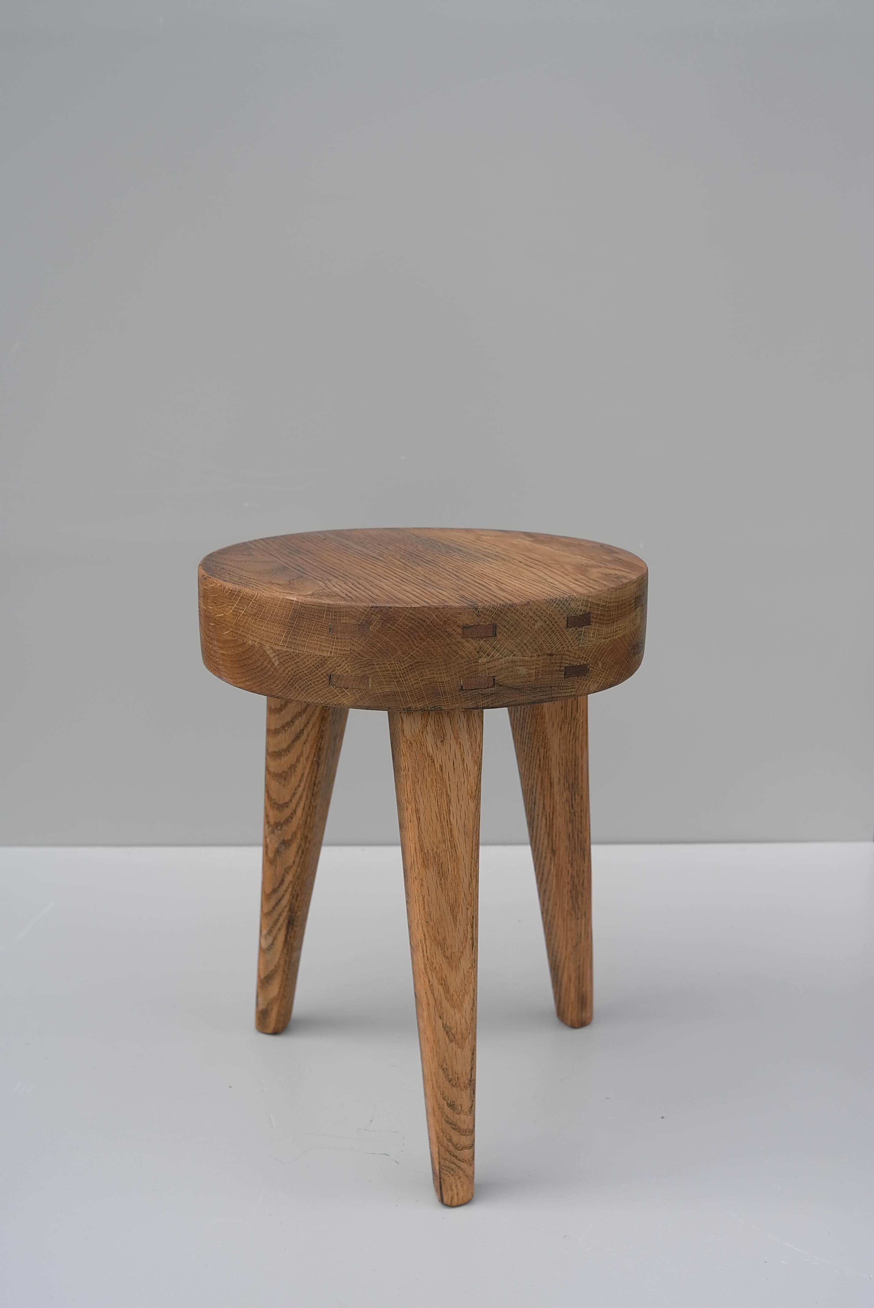 Solid Oak stool , France 1960's. Beautiful made, great Craftsmanship, lovely wood joints.