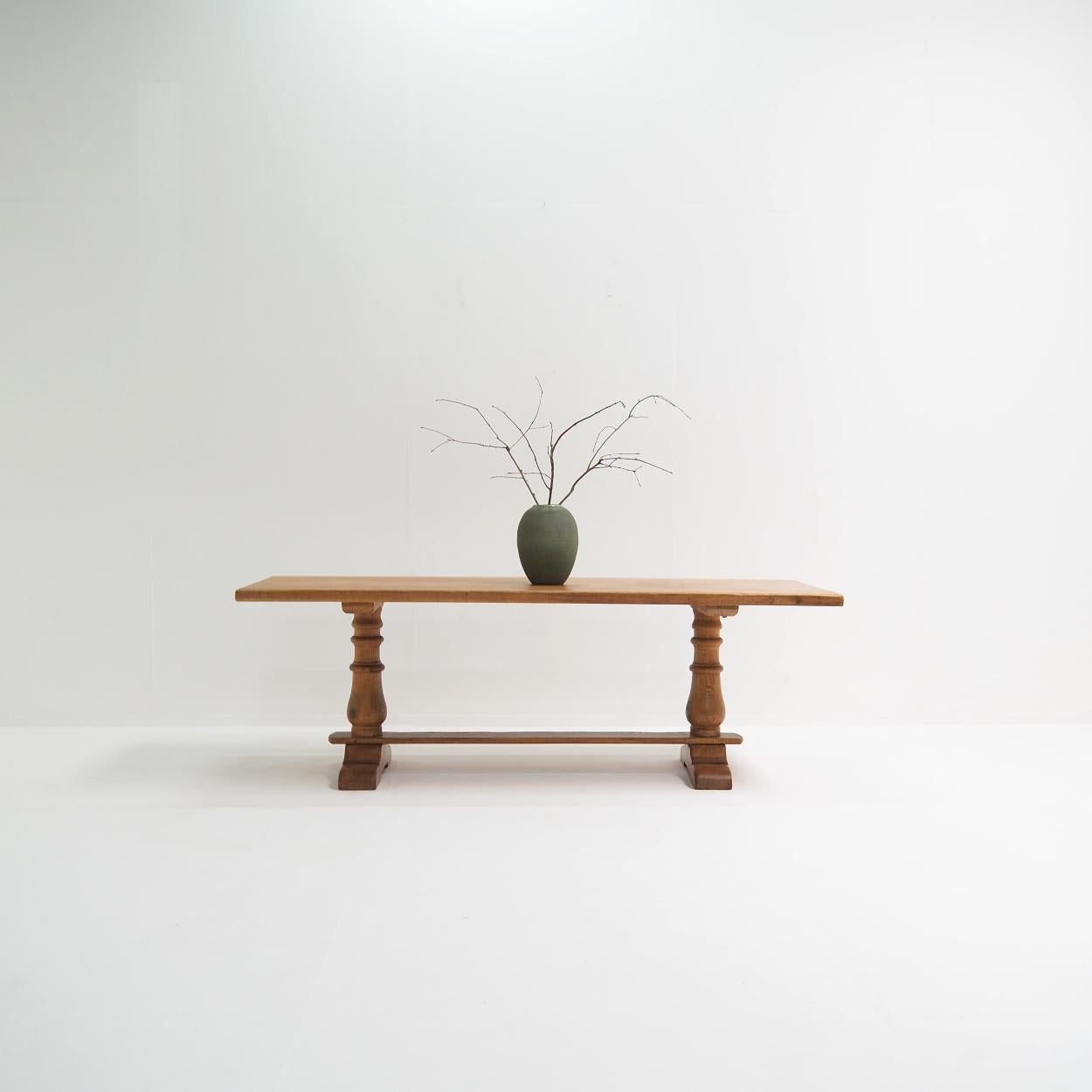 Beautiful table that was most likely used as a refectory table in a monastery. The table is made of solid oak, and has the typical ‘brancard’ crossbeam between the two legs.

The table is very sturdy and has a very nicely aged patina corresponding