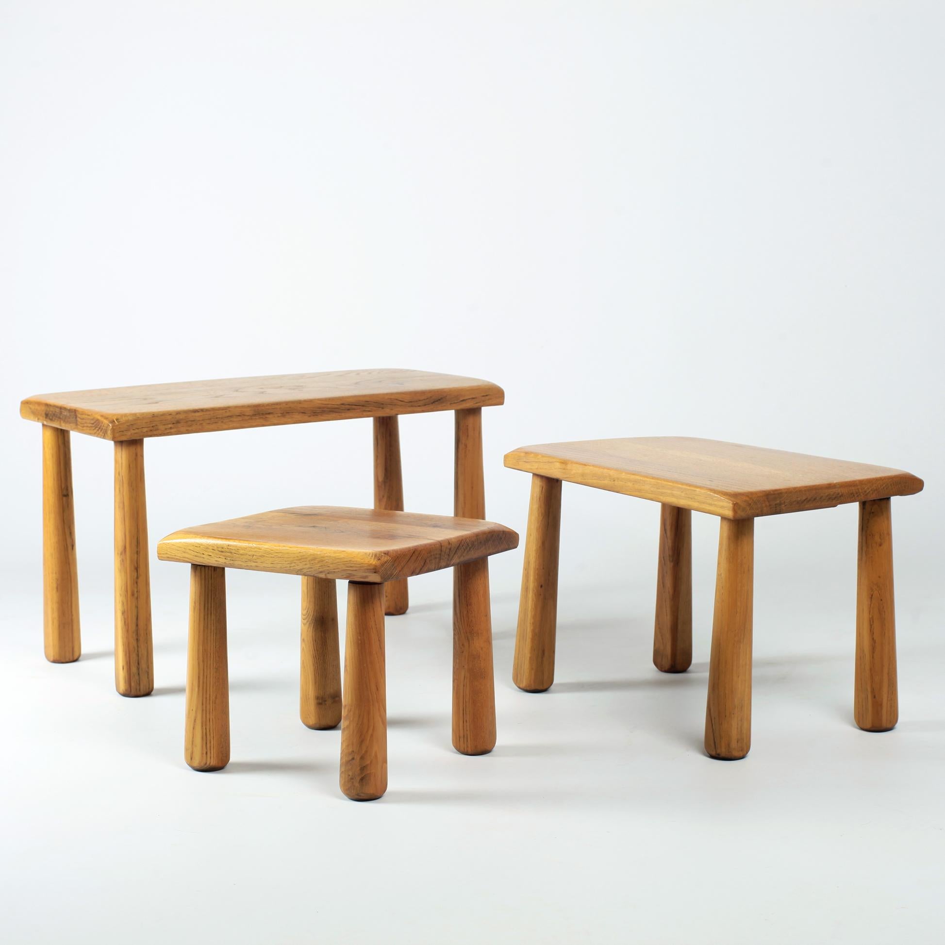 Set of three solid oak nesting tables in the style of Charlotte Perriand, 1960s.
Nice patina
Measures: 58cm x 27cm H 35cm
44cm x 28cm H 30cm
28,5cm x 28cm H 26.
   