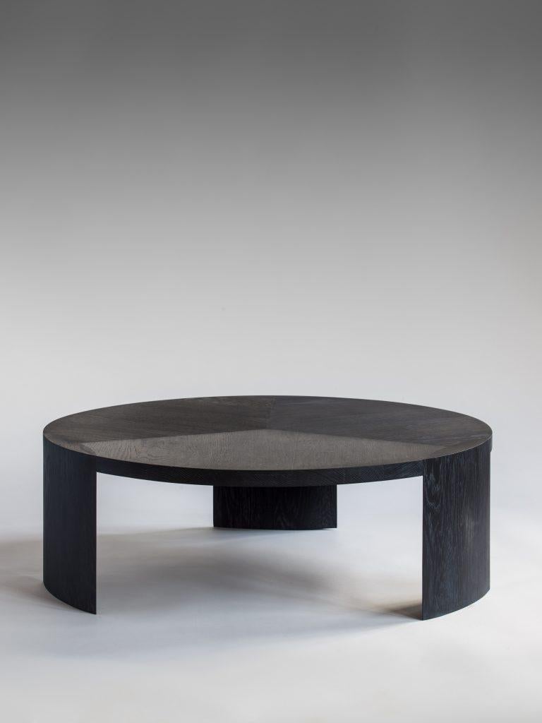 Nort coffee table by Tim Vranken
Materials: Solid oak
Dimensions: D 90 x H 30 cm

Tim Vranken is a Belgian furniture designer who focuses on solid, handmade furniture. Throughout his designs the use of pure materials and honest natural processes are