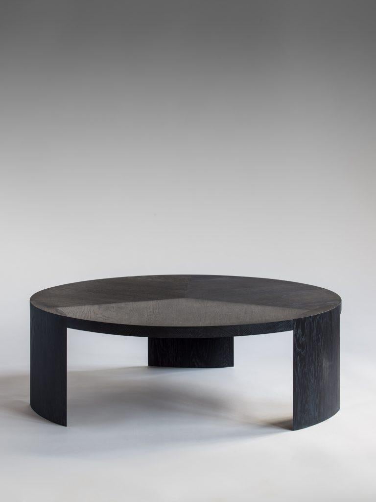 Nort coffee table by Tim Vranken
Materials: Solid oak
Dimensions: D 90 x H 30 cm

Tim Vranken is a Belgian furniture designer who focuses on solid, handmade furniture. Throughout his designs the use of pure materials and honest natural processes