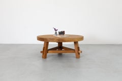 Table basse ronde d'inspiration Pierre Chapo