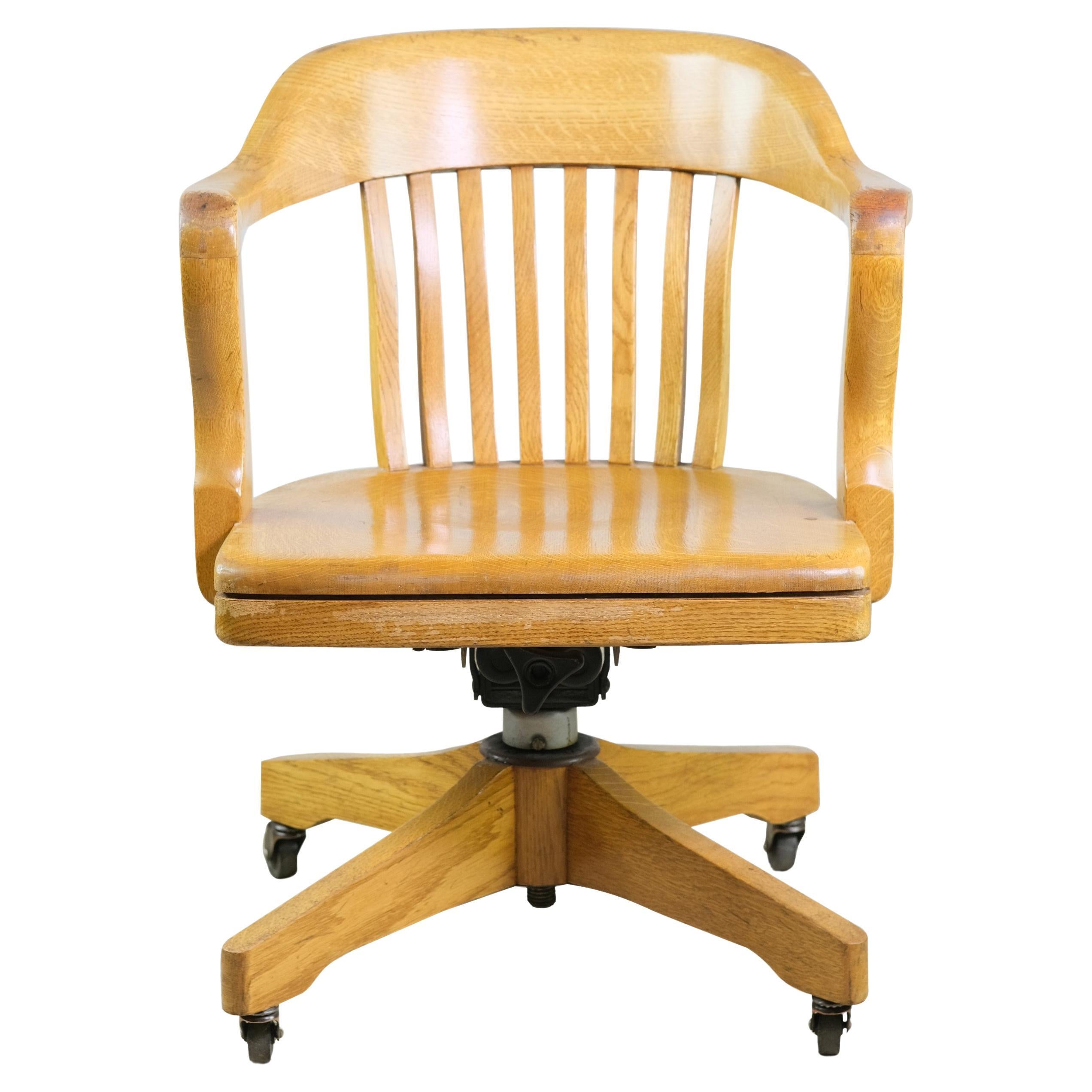 Solid Oak Rolling Bankers Chair Adjustable Seat Light Stain
