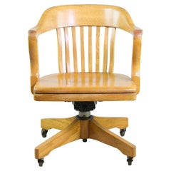 Antique Solid Oak Rolling Bankers Chair Adjustable Seat Light Stain