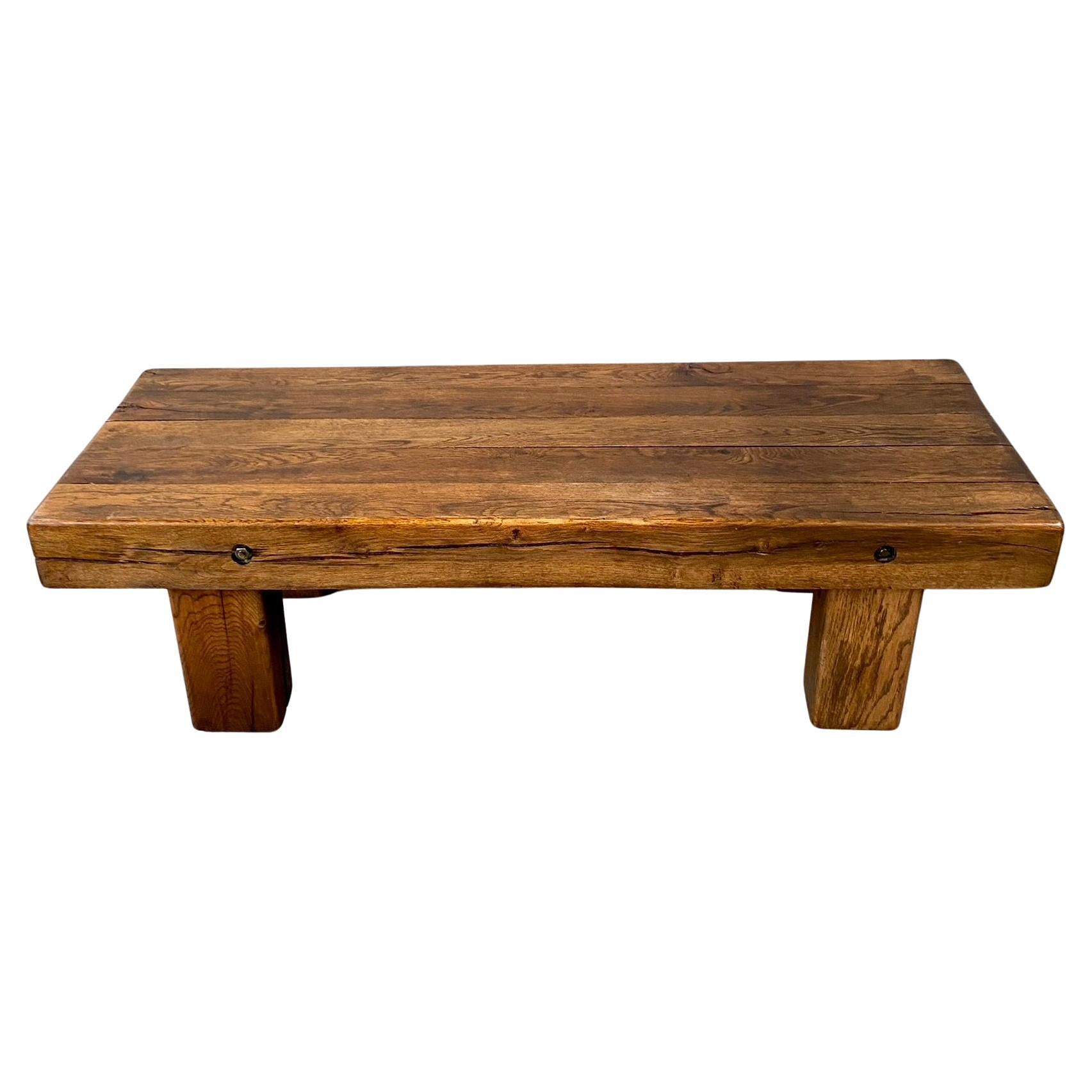 Introducing the Solid Oak Wabi Sabi Brutalist Coffee Table, a timeless piece originating from 1960s France. This exquisite table seamlessly blends rustic charm with a modern aesthetic, making it an ideal addition to interiors characterized by