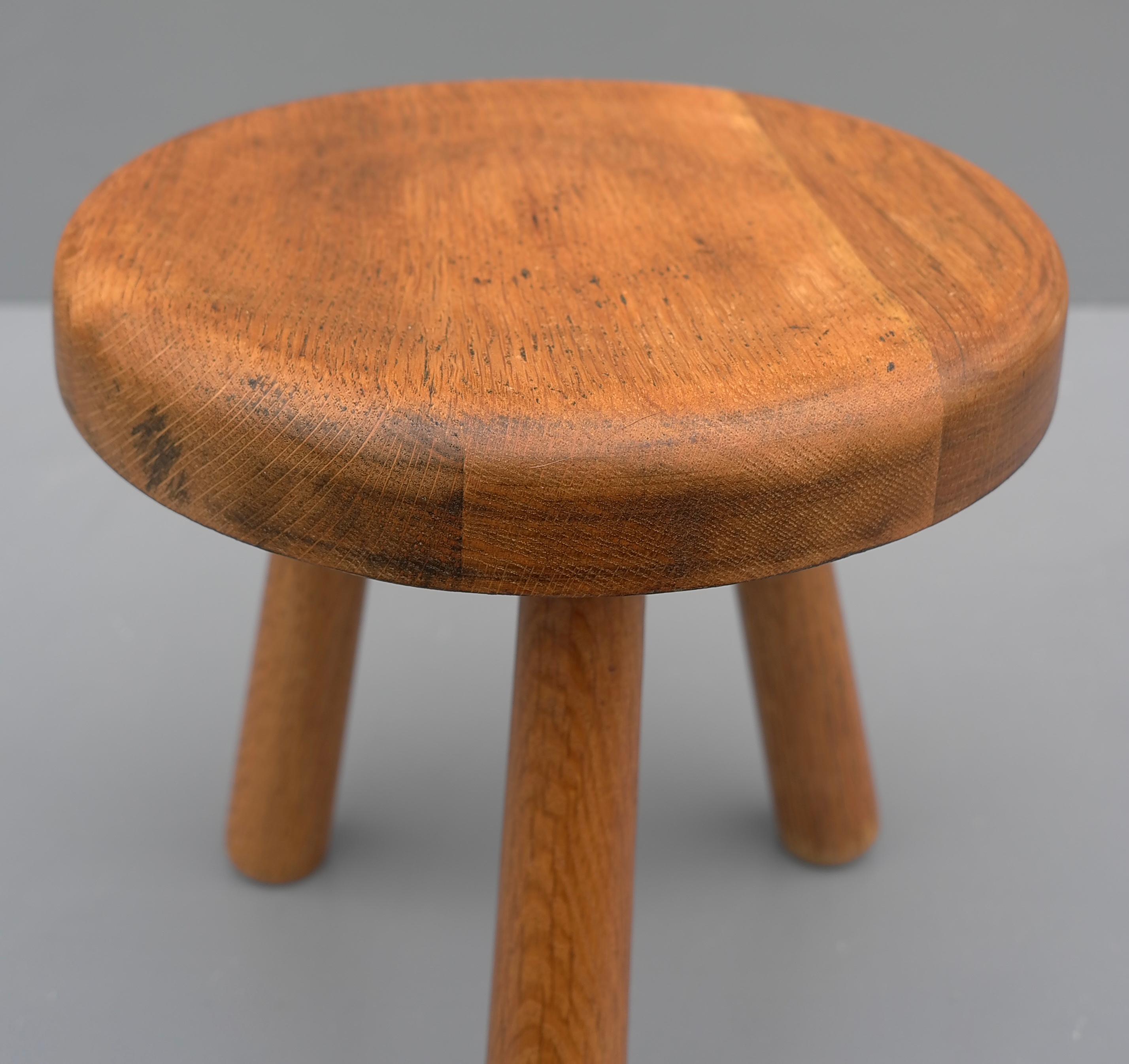 Solid oak stool in style of Charlotte Perriand, France 1950's.