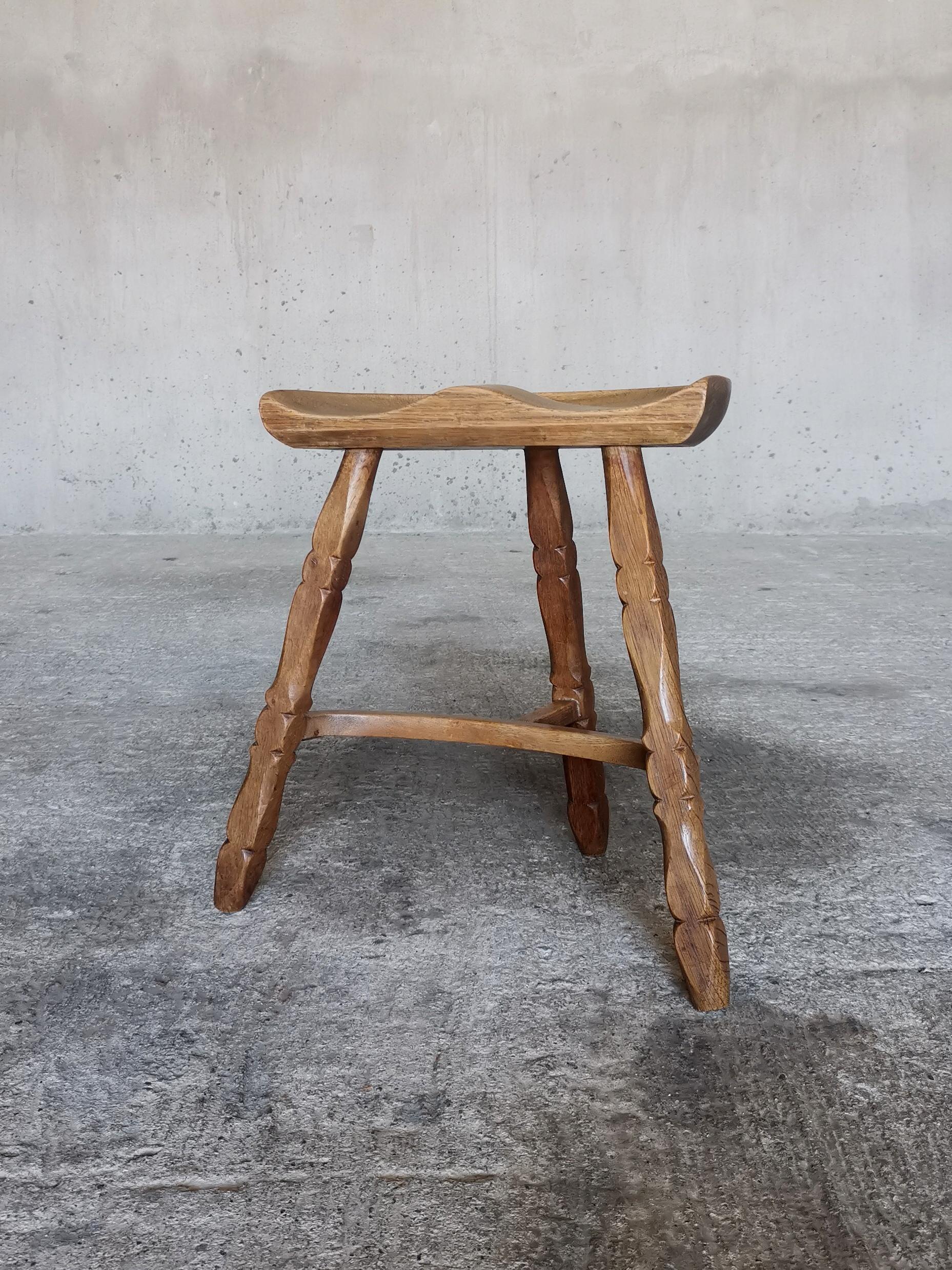 20th Century Solid oak stool in style of Henning Kjærnulf, hand sculpted seat, Denmark 1960s  For Sale