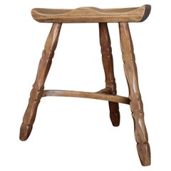 Retro Solid oak stool in style of Henning Kjærnulf, hand sculpted seat, Denmark 1960s 