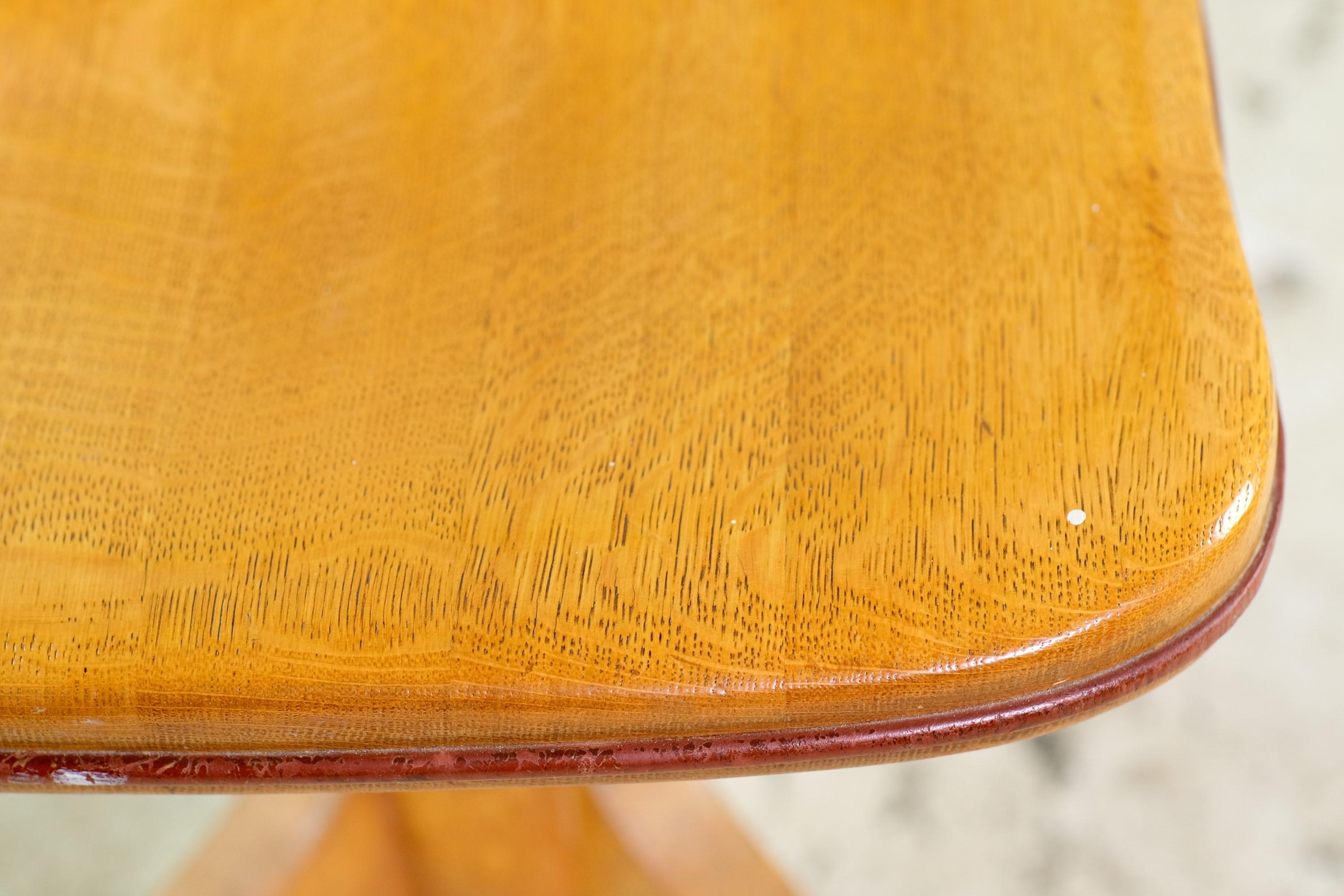 Mid-Century Modern bankers chair made of light tone oak with an adjustable steel base. This solid rolling chair dates between the 1950s and 1960s. Small quantity available at time of posting. Priced each. Please inquire. Please note, this item is