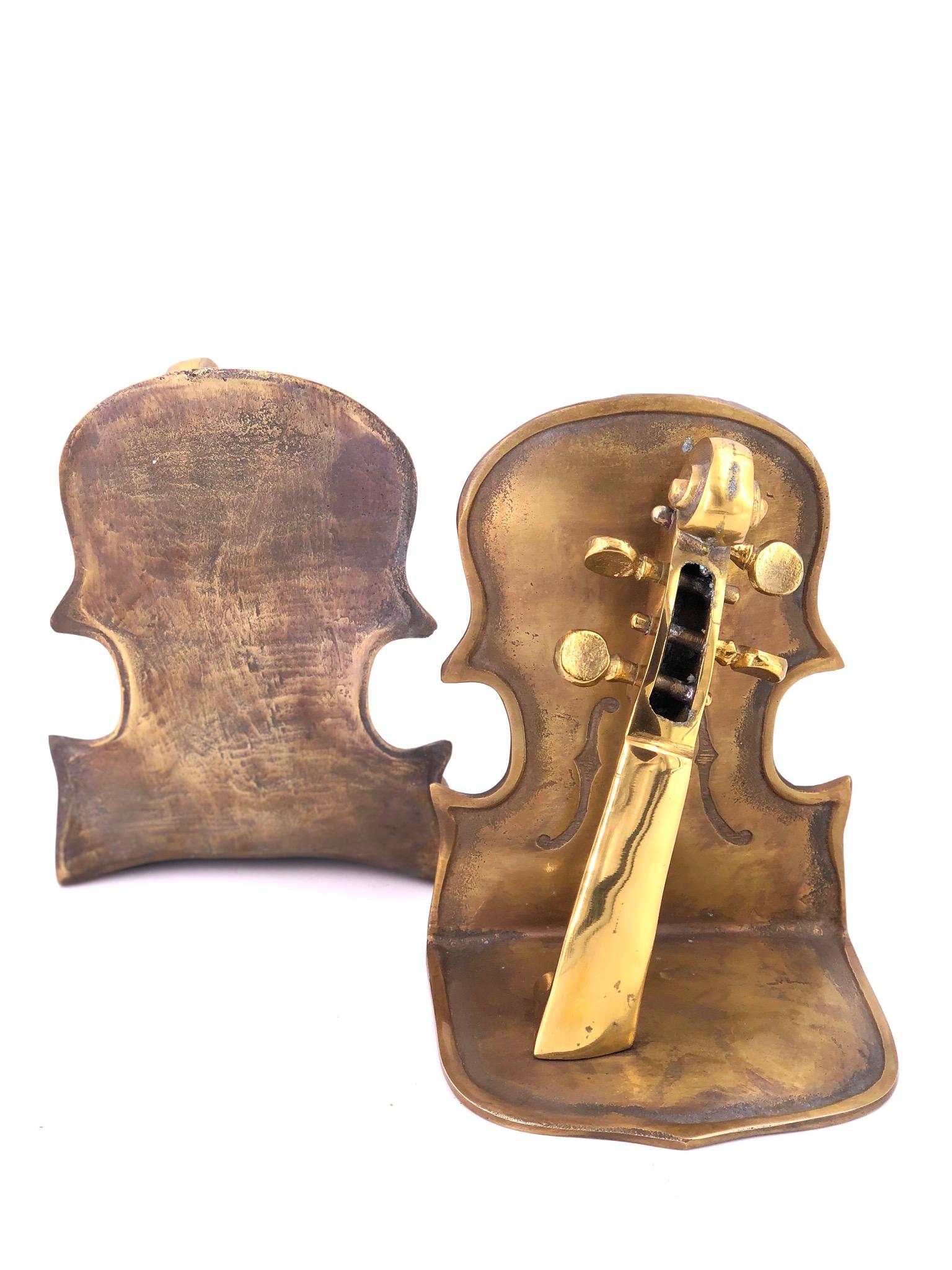 American Solid Pair of Polished Patinated Brass Cello Bookends For Sale
