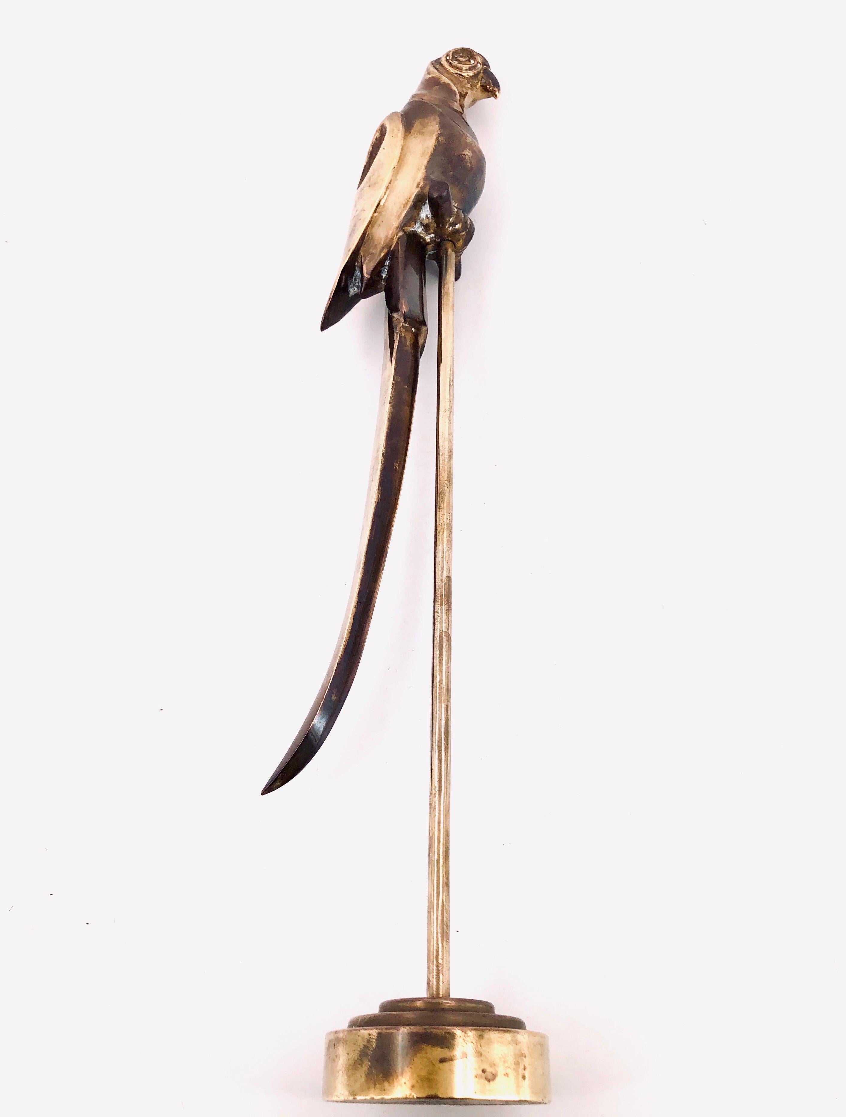 brass parrot on stand