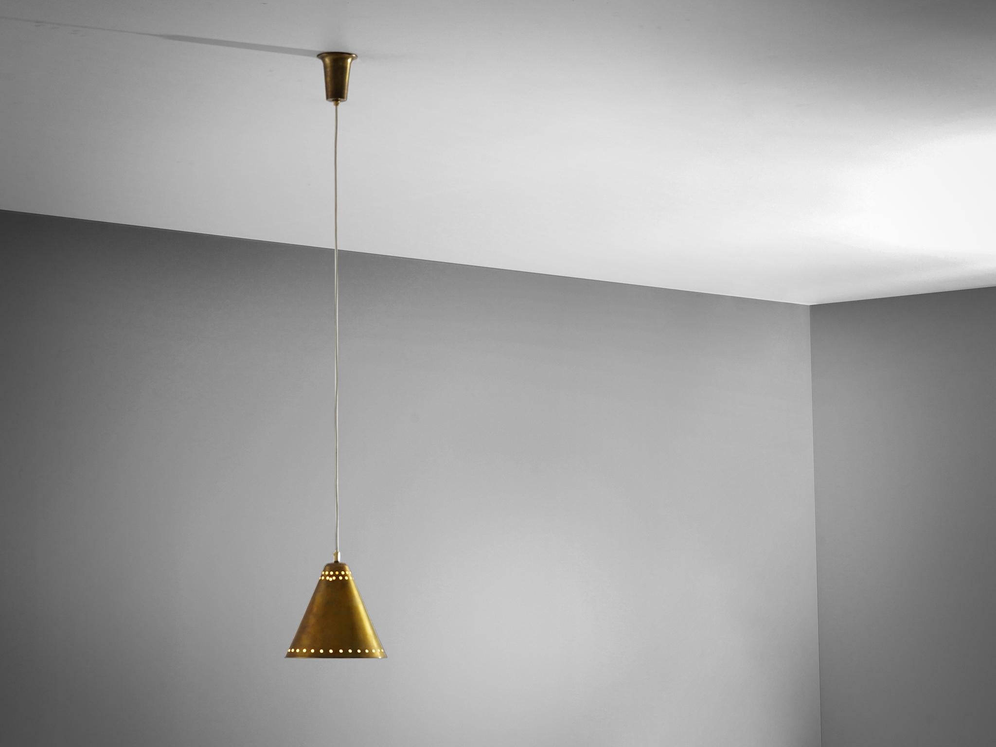 Pendant, brass, Italy, 1950s.

The conical golden lampshade features delicate perforated slots on the rim. The light from within the shade shines through these small slots, creating a gorgeous aesthetic effect. The unevenly made perforation