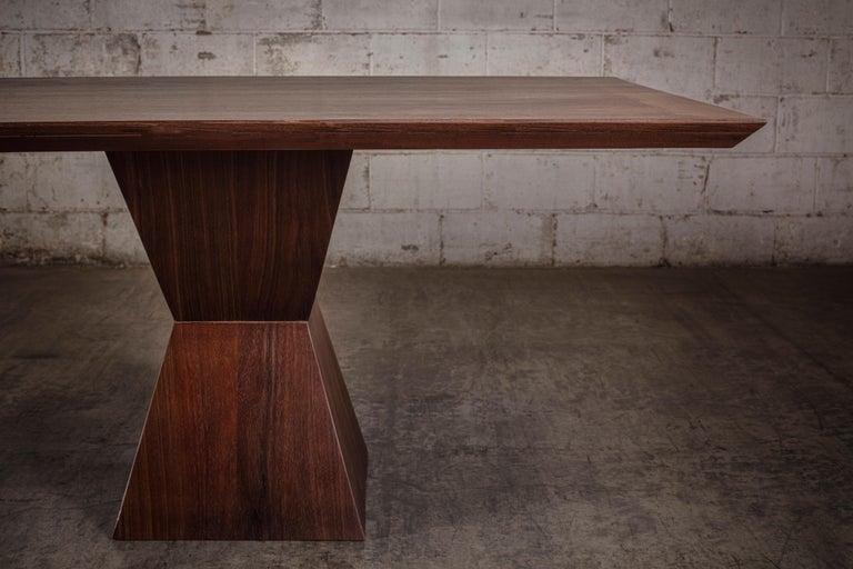 All natural peruvian walnut solid wood dining table.