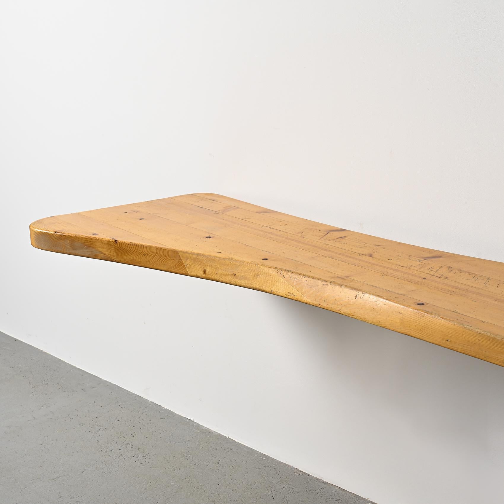 Designed by Charlotte Perriand for the residences of Les Arcs 1800 ski resort in the 1970s, this solid pine bar top features a free-form outline with a slightly slanted edge. Originally integrated in front of kitchen areas, it was installed in
