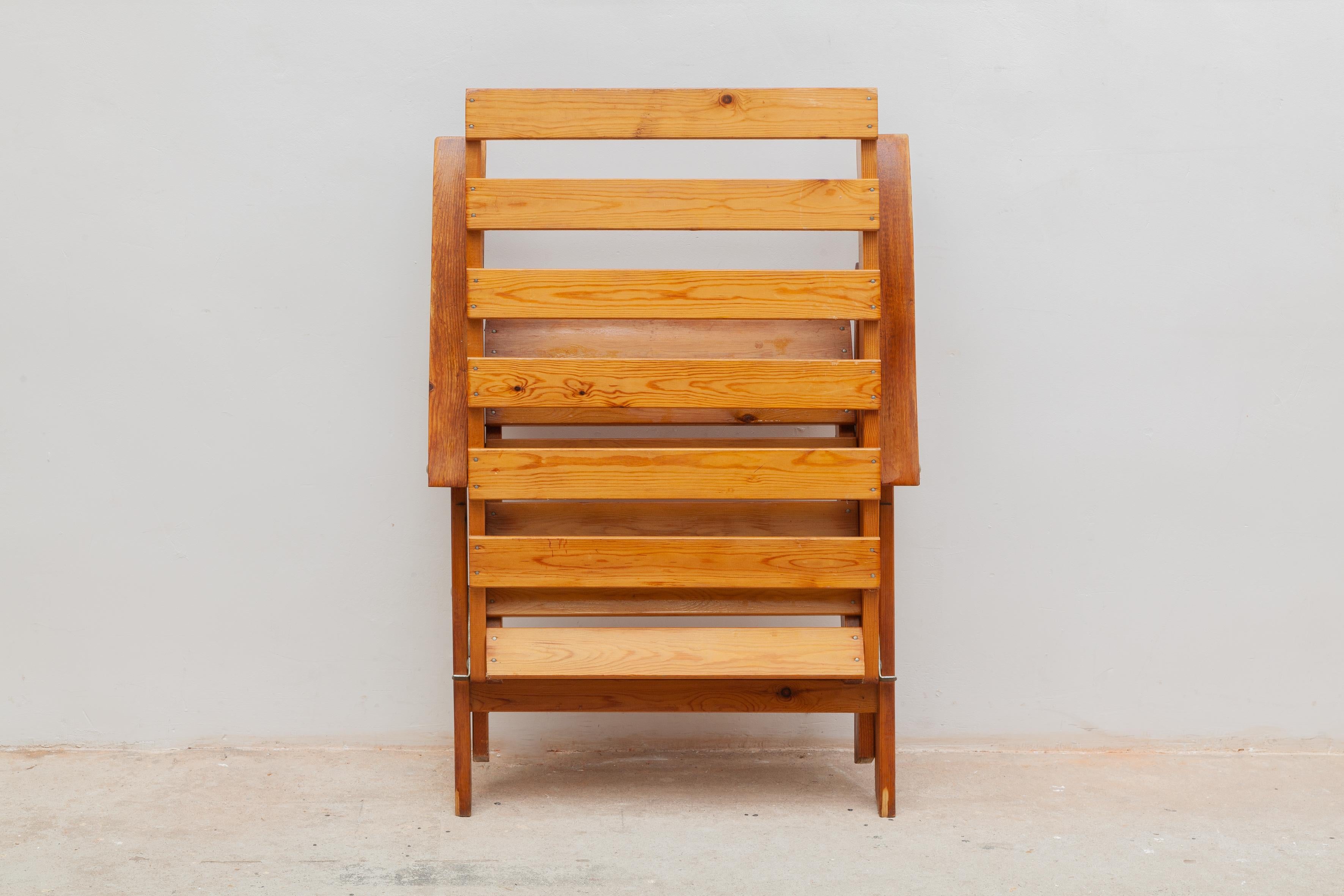 Vintage outdoor chairs. Solid wooden slat construction with armrests. Fold-able for easy storage.
 Dimensions: 63 W x 97 H x 78 D cm, seat 42 cm high.