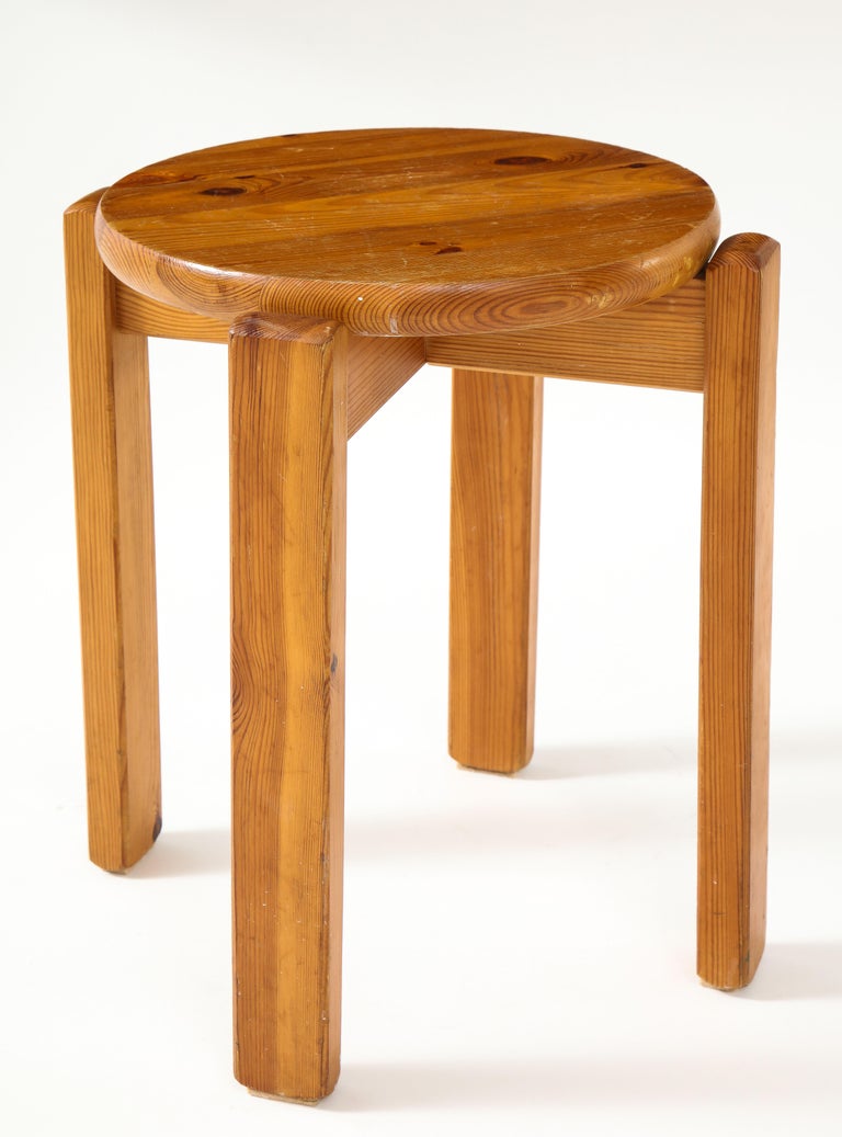 Solid pine stool, France, c. mid-20th century. 

This well-crafted vintage stool consists of a round top, four legs, and solid pine construction. Can be variably used as a sitting stool, side table, end table, and display surface.