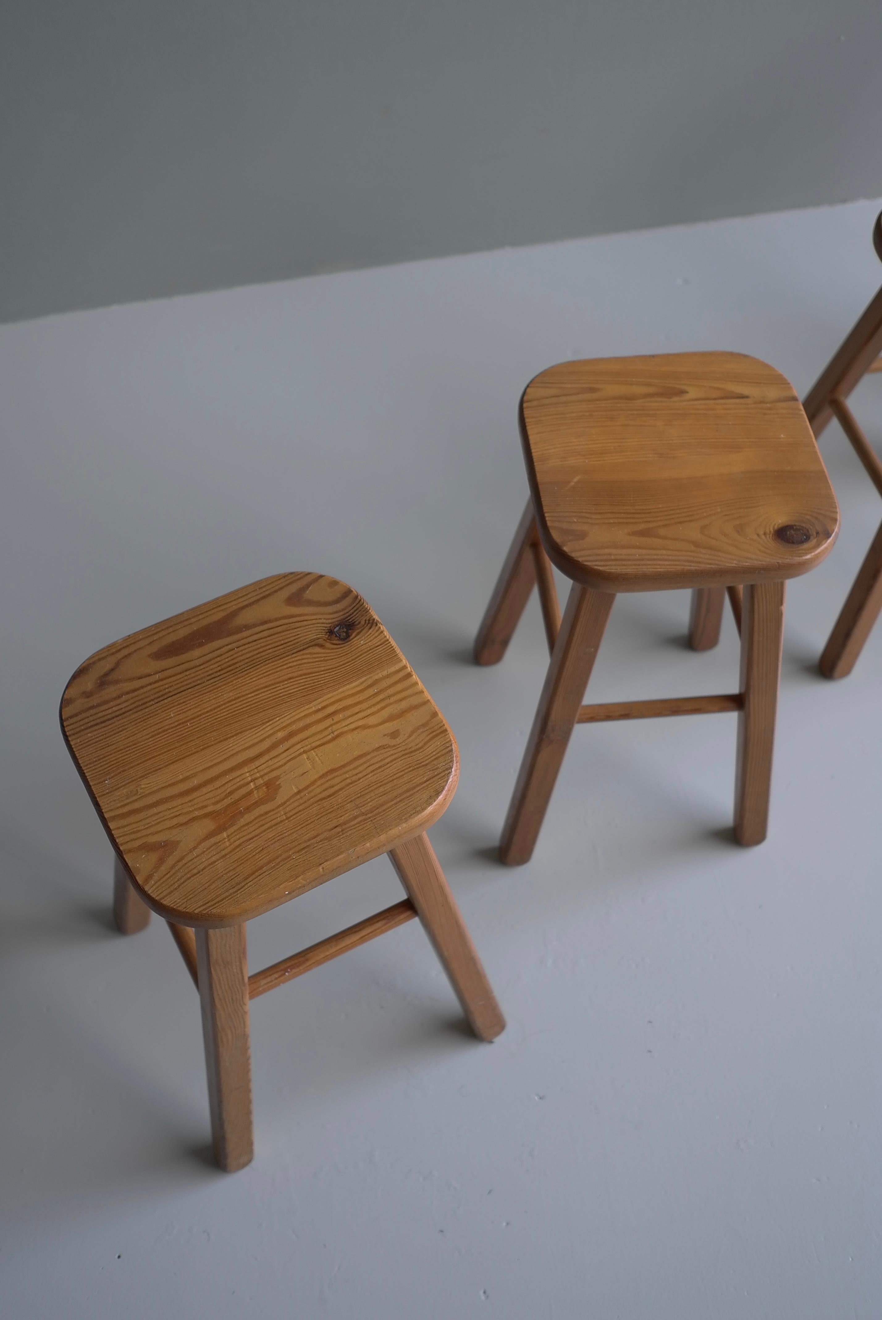 Set of four Pine Stools in style of Charlotte Perriand, France 1960's.