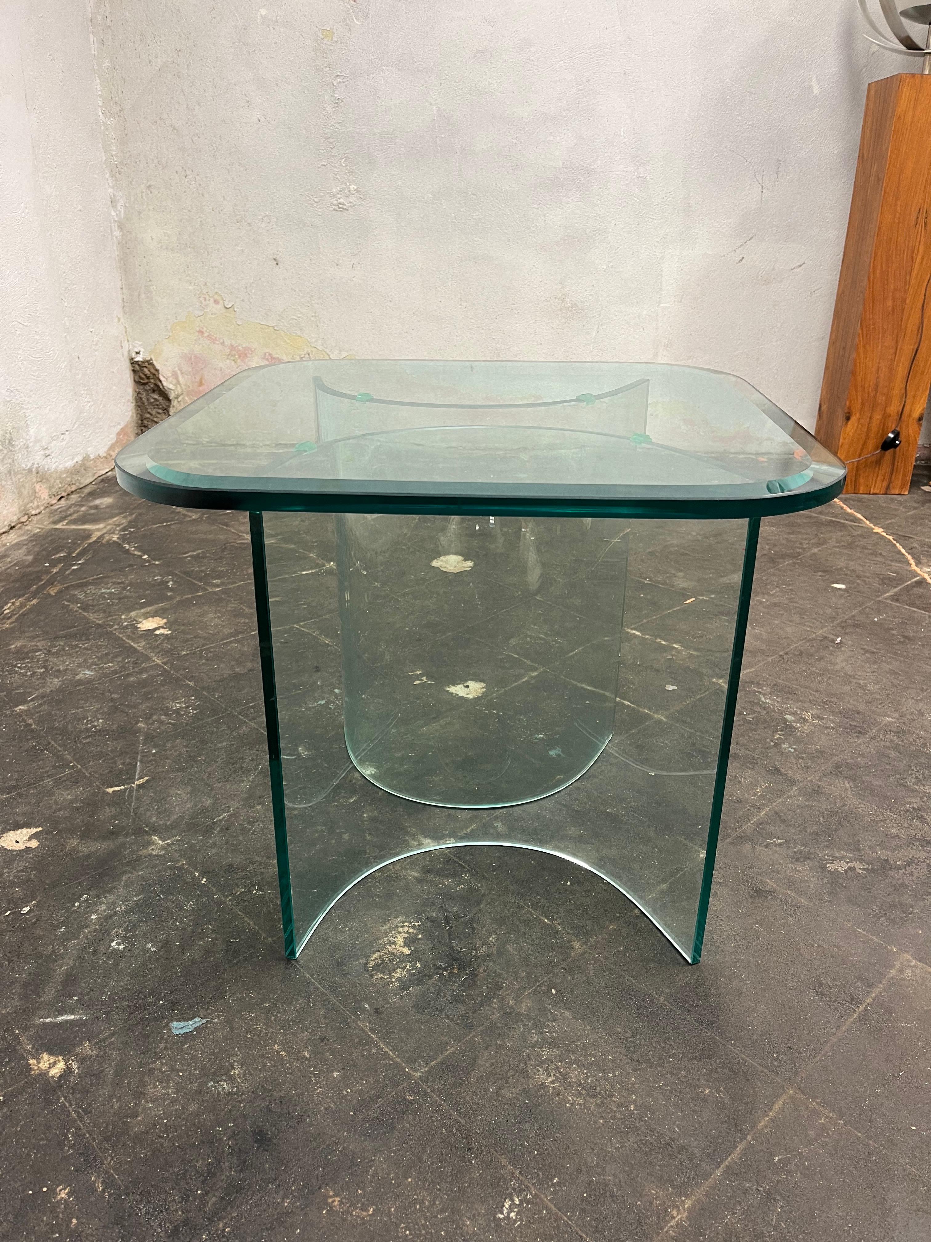 Thick beveled glass on curved glass bases. Most likely Italian made in the manner of  Fontana Arte. 
Curbside to NYC/Philly $350