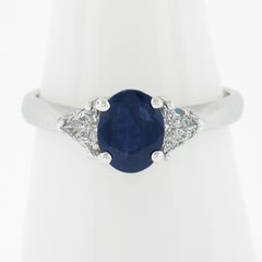Solid Platinum 1.49ctw GIA No Heat Oval Blue Sapphire & Trillion Diamond Ring