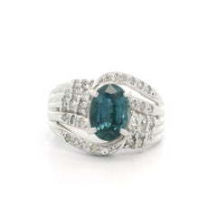 Anello in platino massiccio con zaffiro ovale e diamante da 1,80 ctw e fascia larga da 12,9 mm