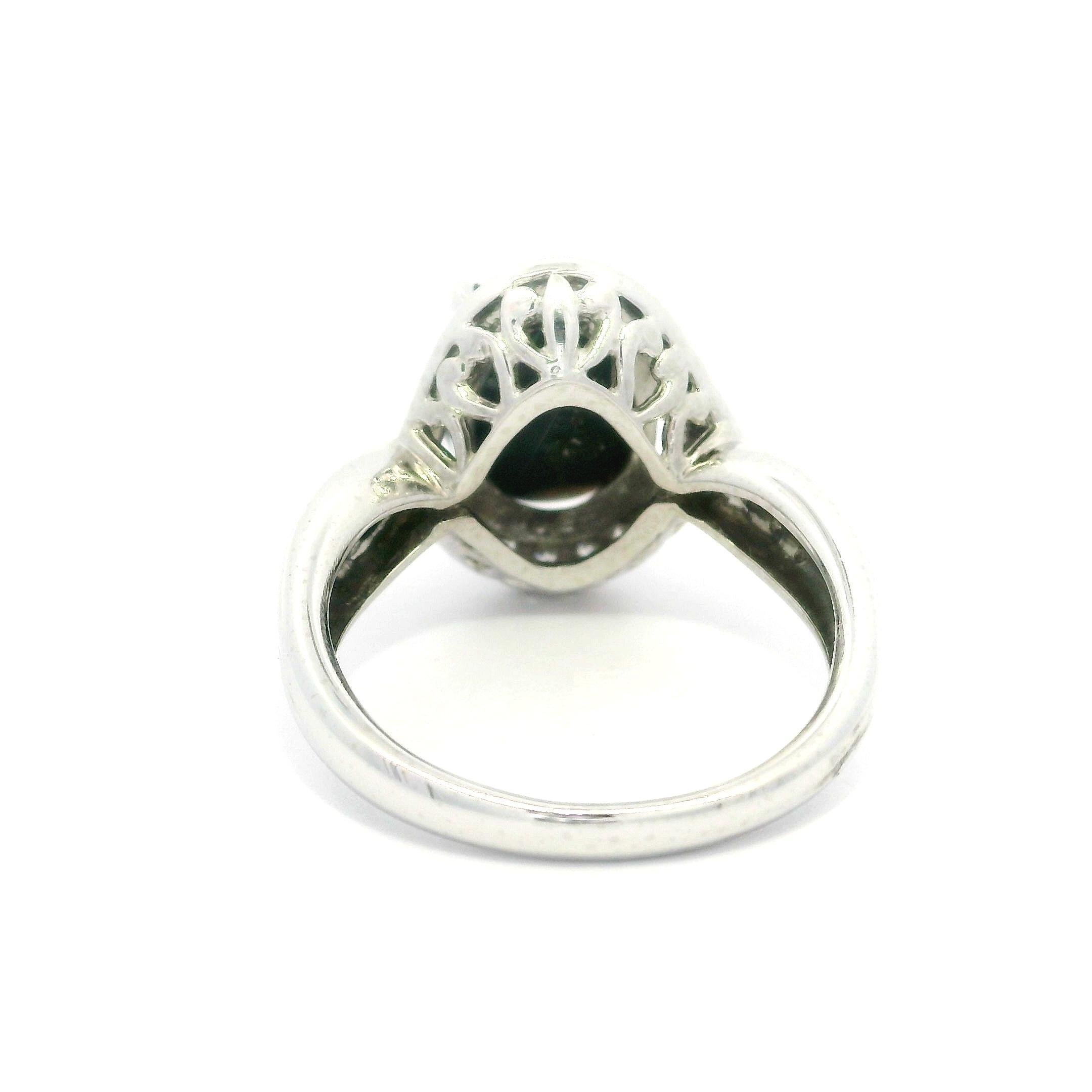 Anello in platino massiccio con opale nero GIA da 2,69 carati e diamante aureolato con spalla ritorta in vendita 1