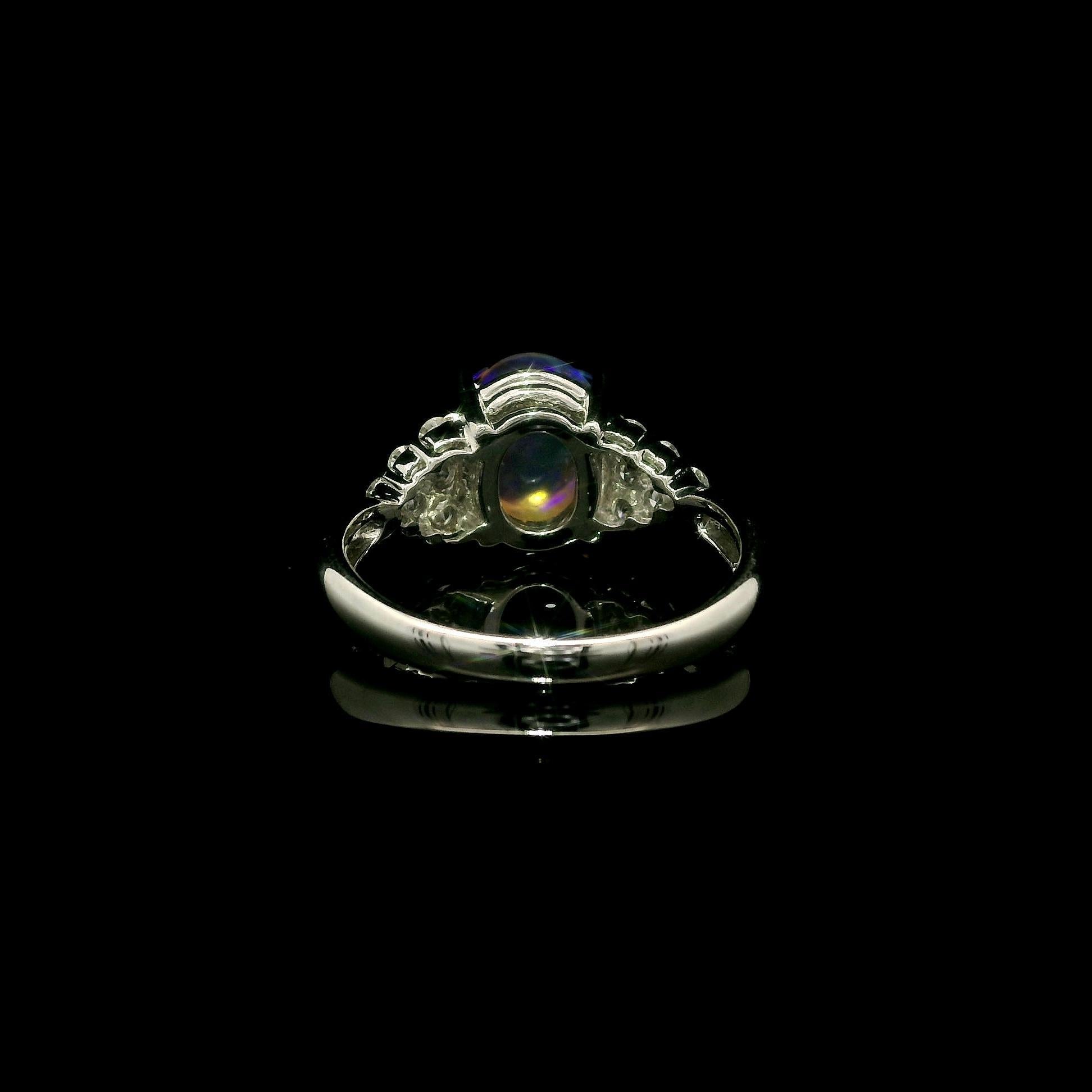 Anello classico in platino massiccio con opale ovale cabochon e diamanti da 2,8 ct. in vendita 4